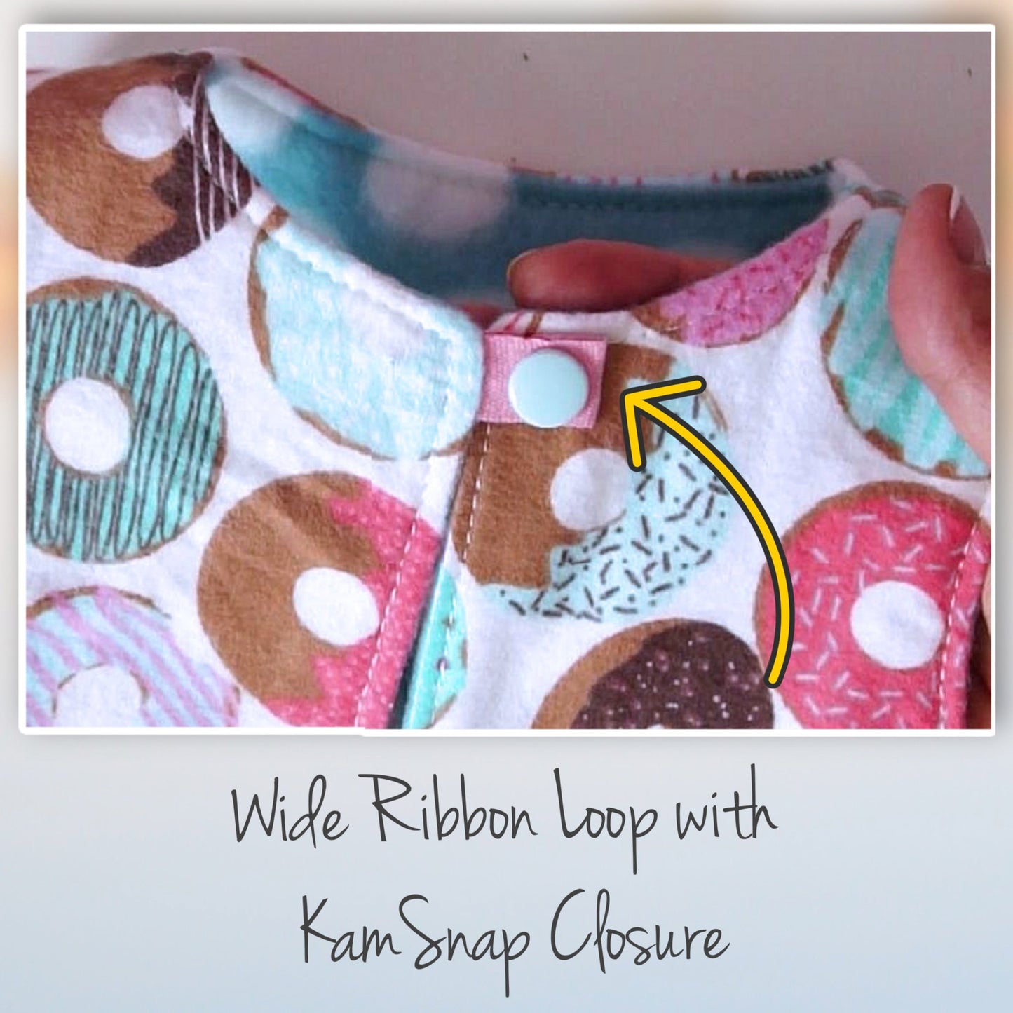 Baby vest, pdf sewing pattern, age 1-12. Fully reversible with cute KamSnap closure. In warm blue and white polka dot fleece and brushed cotton lining with large donut print.