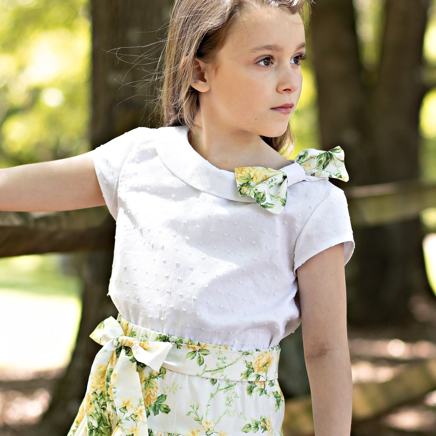 Beatrice blouse, pdf sewing pattern with assymmetrial collar and feature bow. Vute inset sleeves. Comes with YouTube sewing tutorial.