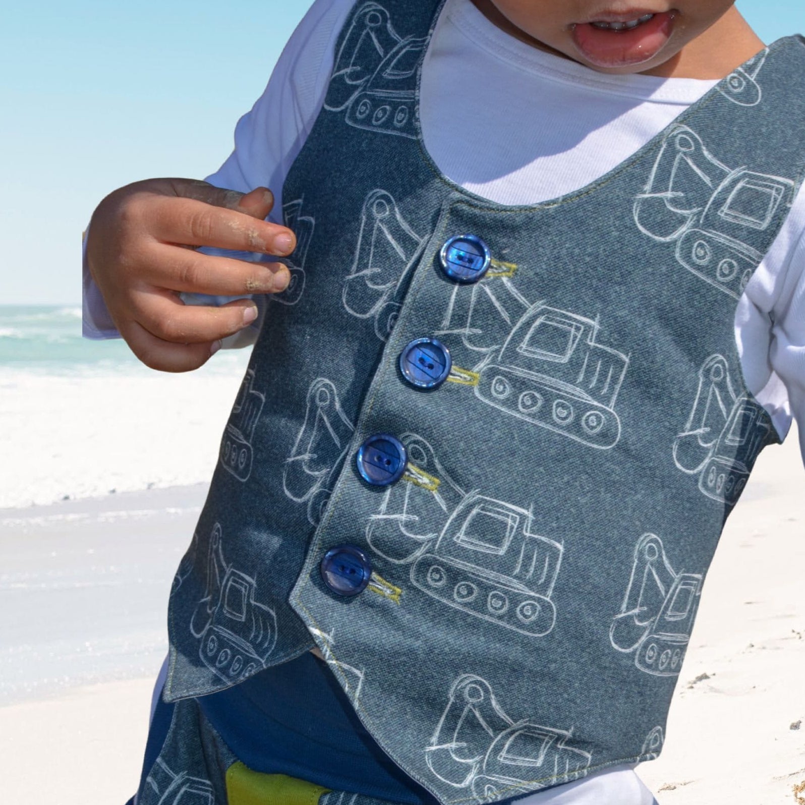 Brooklyn waistcoat, pdf sewing pattern by frocks and frolics. Fully lined with tie backs. Front view, here with buttonholes and buttons. Includes a free video sewing course.