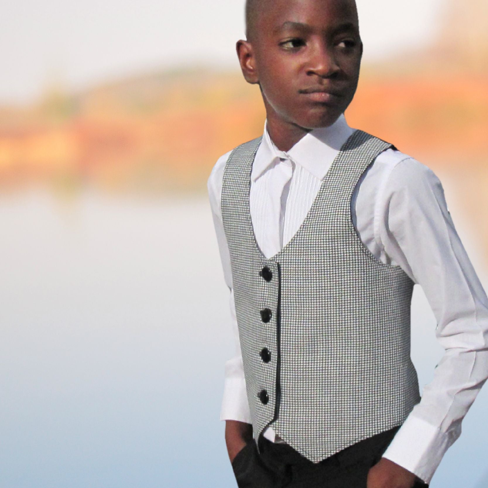 Brooklyn waistcoat, pdf sewing pattern by frocks and frolics. Fully lined with tie backs. Front view. Includes a free video sewing course.