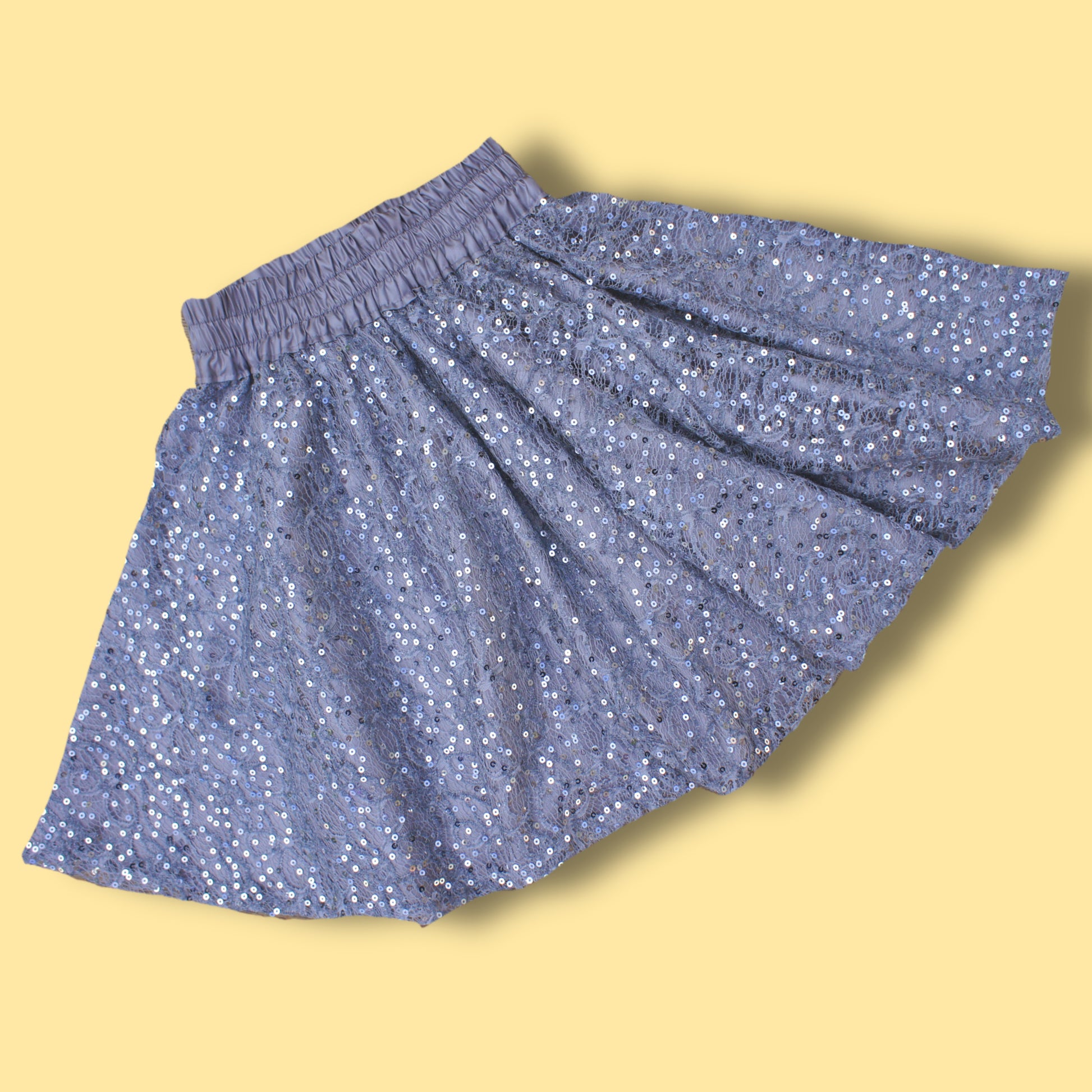 Circle skirt pdf sewing pattern by frocks and frolics. Three different waistband option, here with embroidered net fabric, satin lining and yoga waistband. Each skirt has a video tutorial explaining every step. Here with yoga waistband and jersey skirt.