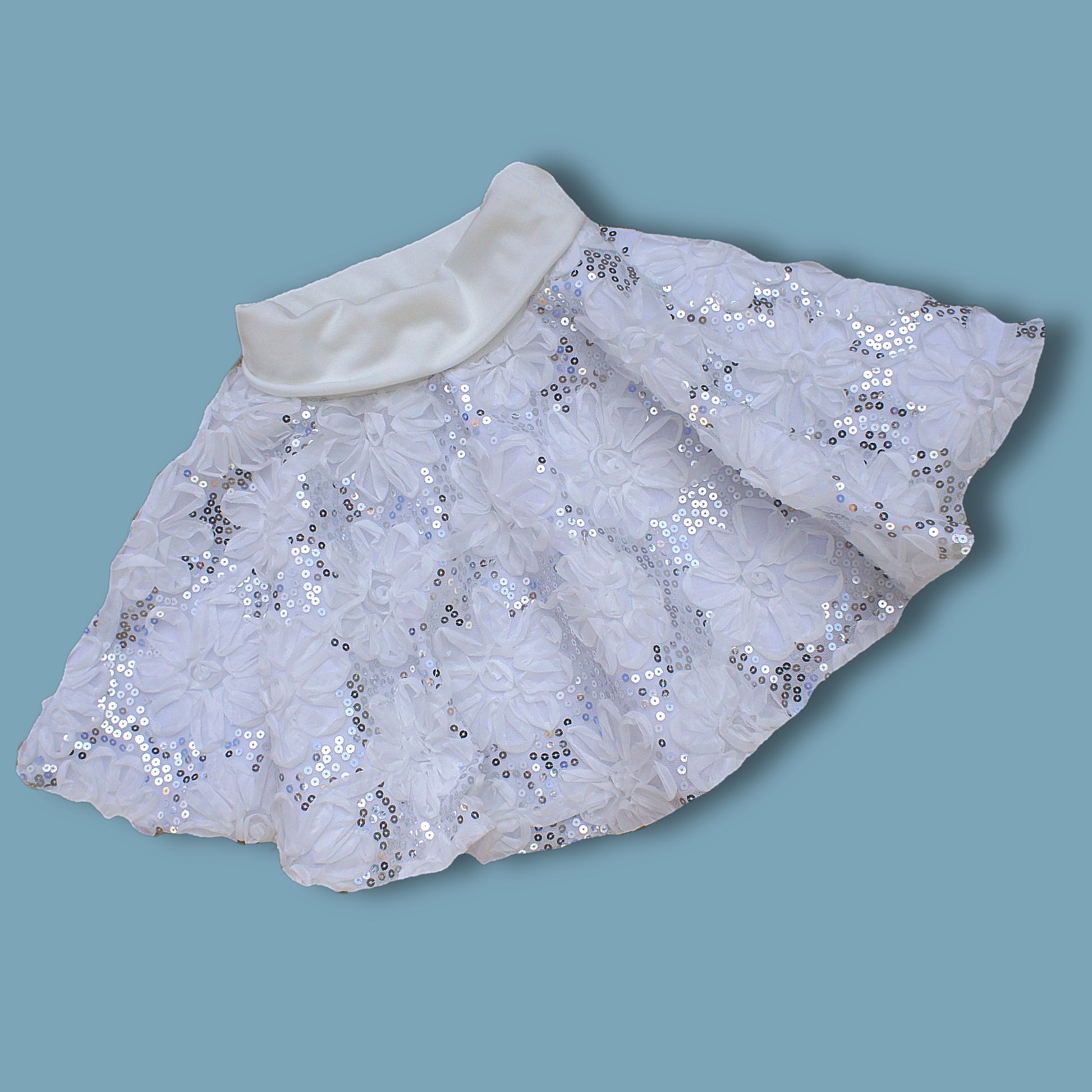 Circle skirt pdf sewing pattern by frocks and frolics. Three different waistband option, here with embroidered net fabric, satin lining and yoga waistband. Each skirt has a video tutorial explaining every step. Here with yoga waistband and jersey skirt.