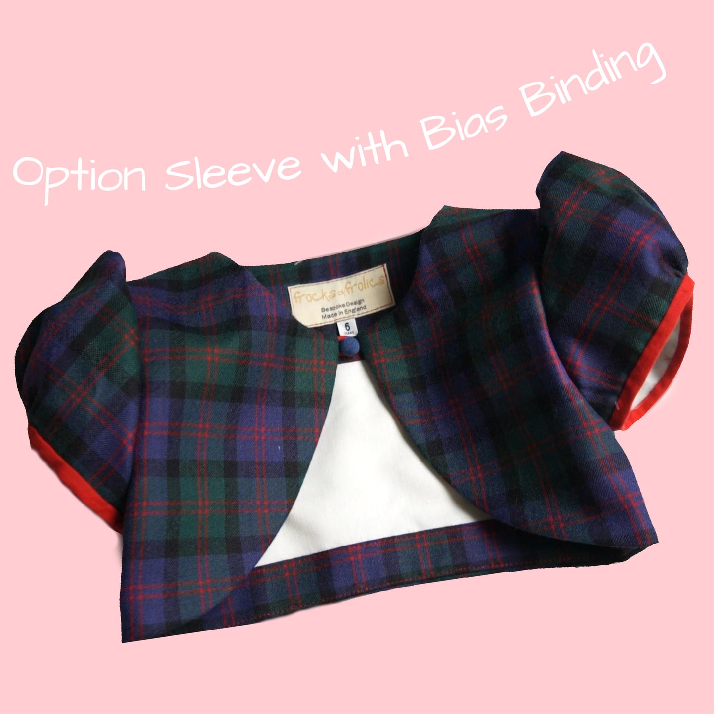 Bolero jacket, pdf sewing pattern by frocks and frolics. With puff sleeves or elasticated sleeves or pretty bias binding. Fully lined. In blue linen with Gingham lining and sleeve cuffs.