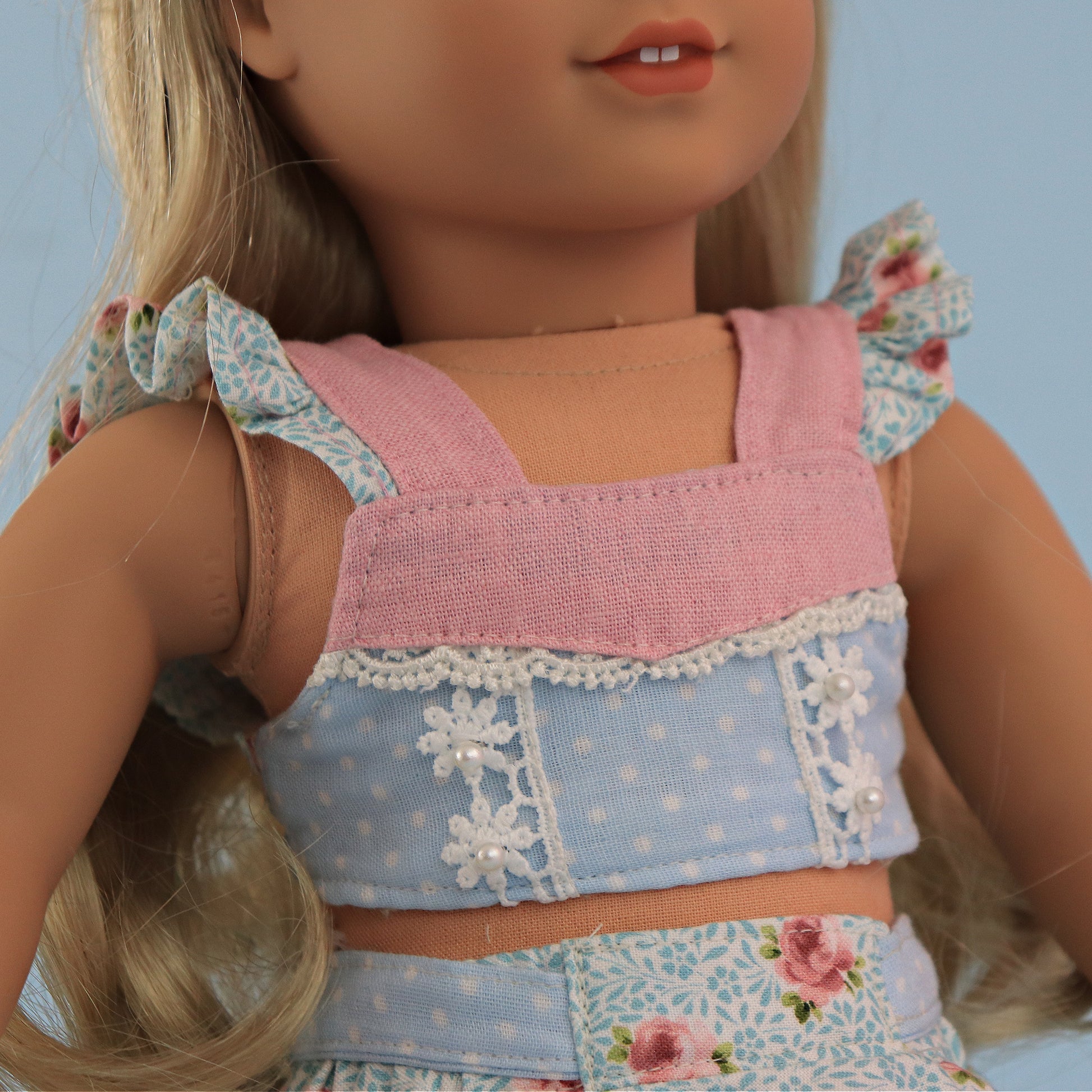 Bonnie & Connie American girl doll clothes by Frocks & Frolics. Gorgeous cropped top and twirl skirt in pastel blue fabrics. With flutter sleeves and big circle skirt.