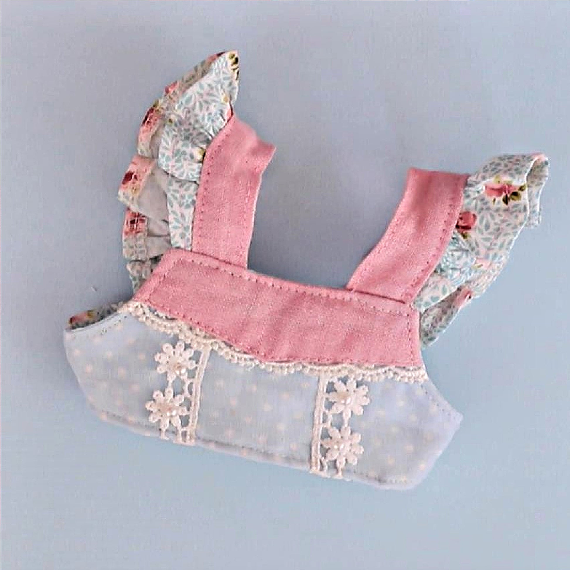 Bonnie & Connie American girl doll clothes by Frocks & Frolics. Gorgeous cropped top and twirl skirt in pastel blue fabrics. With flutter sleeves and big circle skirt. Front view.