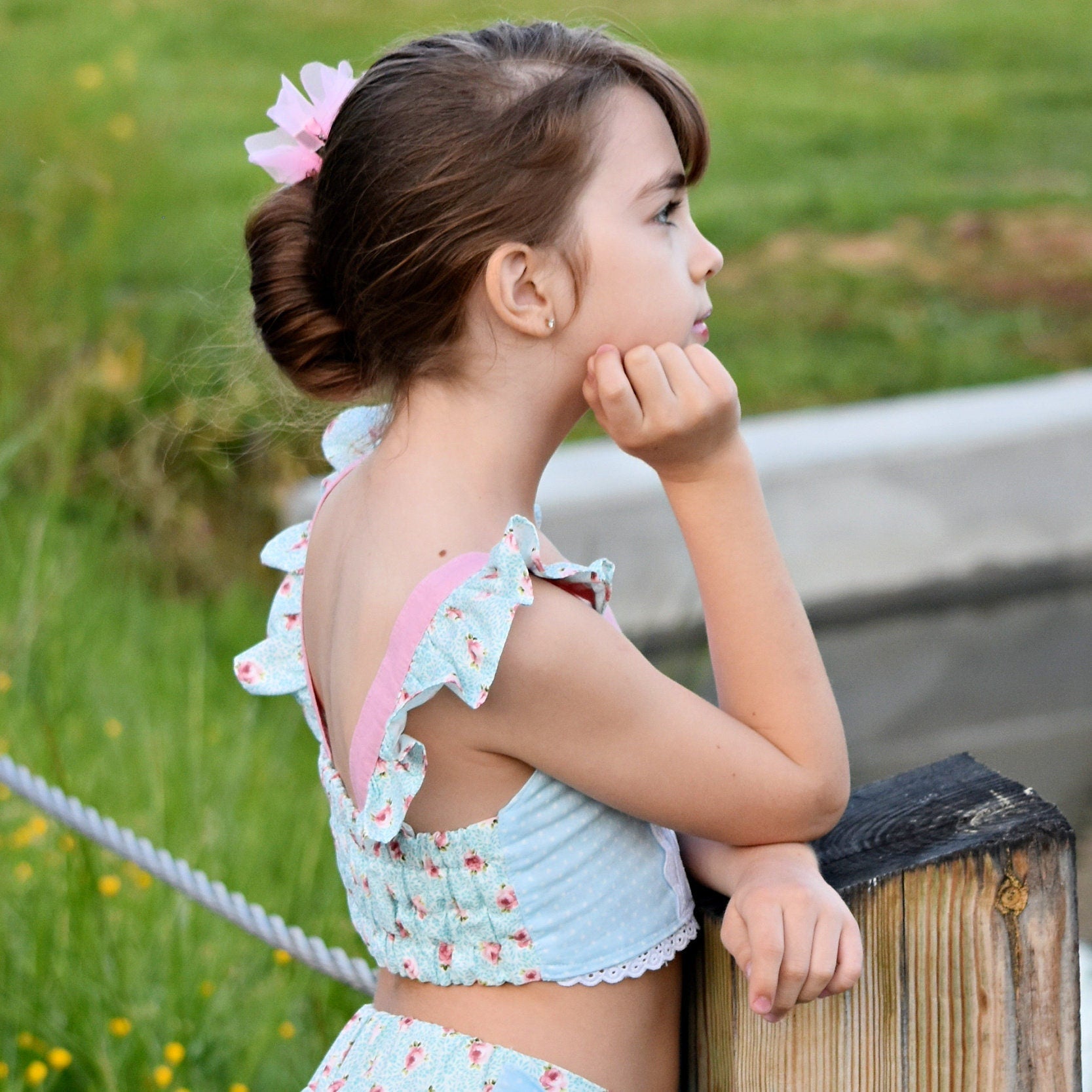 Connie blouse, pdf sewing pattern by Frocks & Frolics. Cute flutter sleeves in pastel blue and pink print by Michael Miller. Side view revealing the elasticated back. Easy for beginners.