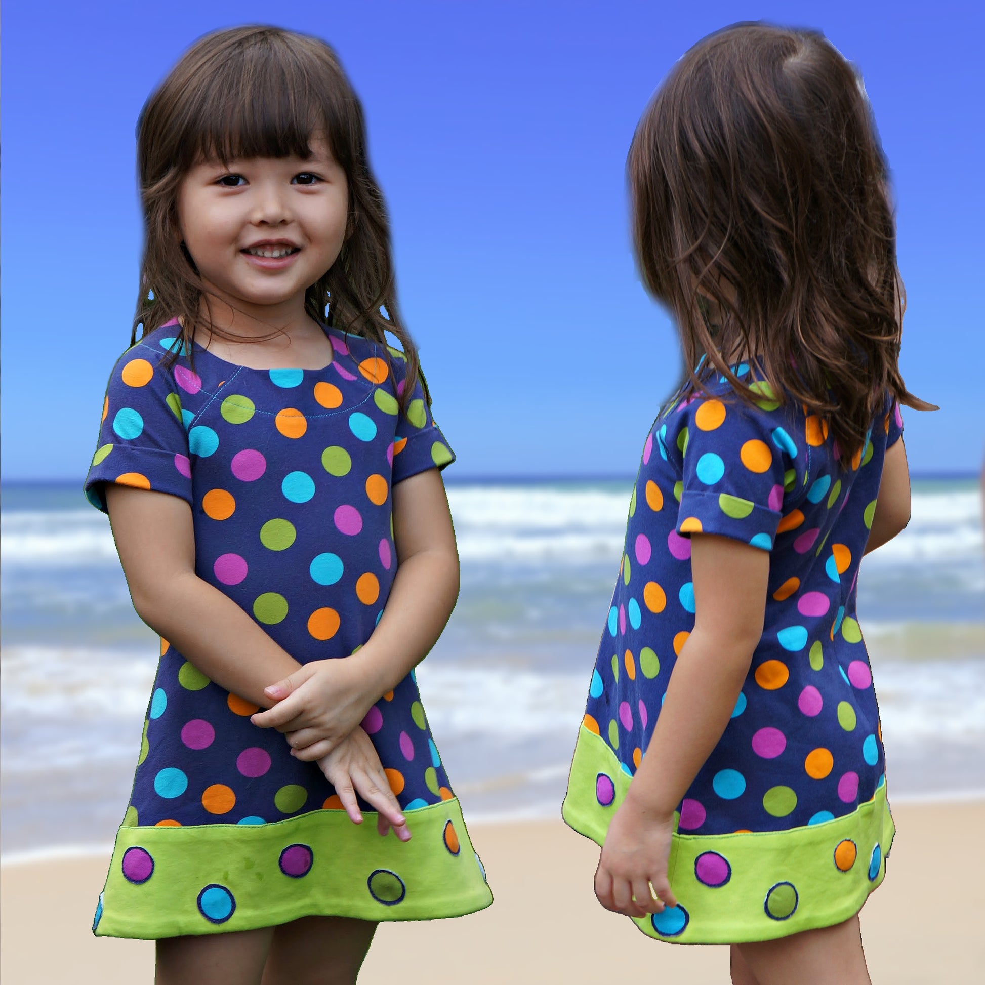 Daisy dress, pdf sewing pattern. Jersey dress with short raglan sleeves and faux turn up. The dress has a KamSnap back closure and deep decoratove hem trim. The pattern comes with a step-by-step video tutorial. Little model by the beach.