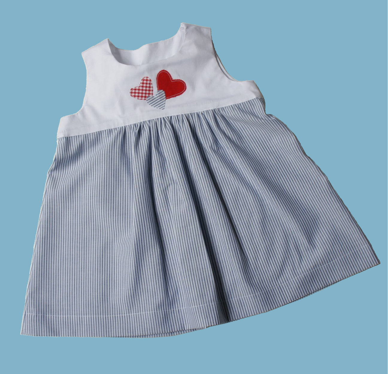 Georgina dress pdf sewing pattern by Frocks & Frolics, high waisted bodice, applique how to in printed cotton. Comes with detailed video tutorial.