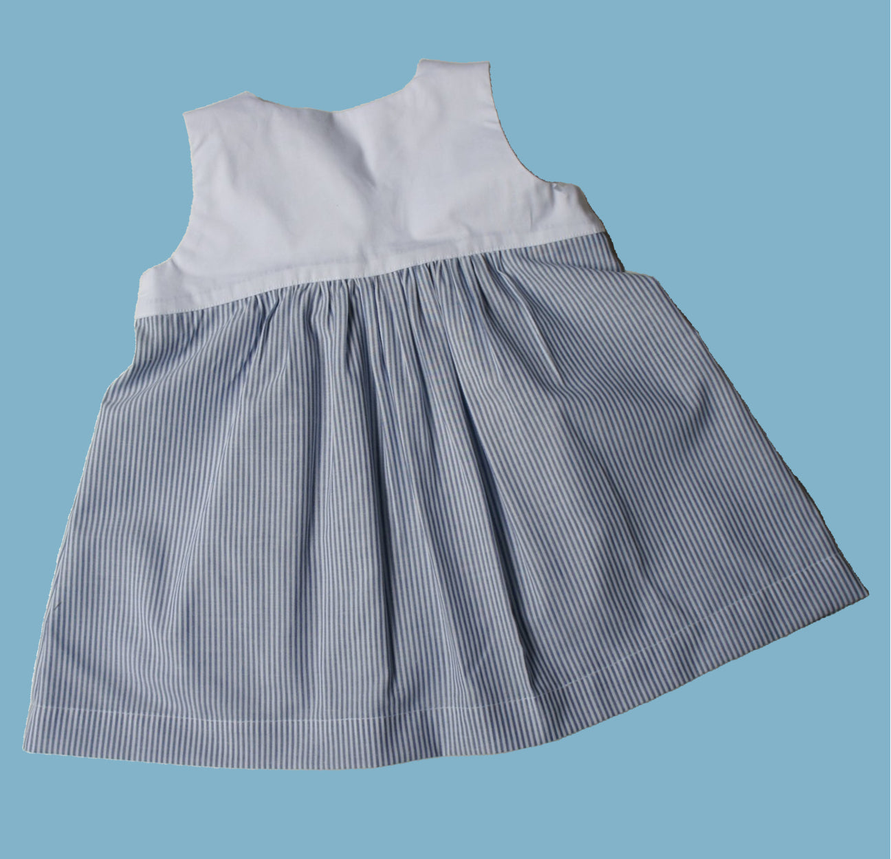 Georgina dress pdf sewing pattern by Frocks & Frolics, high waisted bodice, applique how to in printed cotton. Back view.