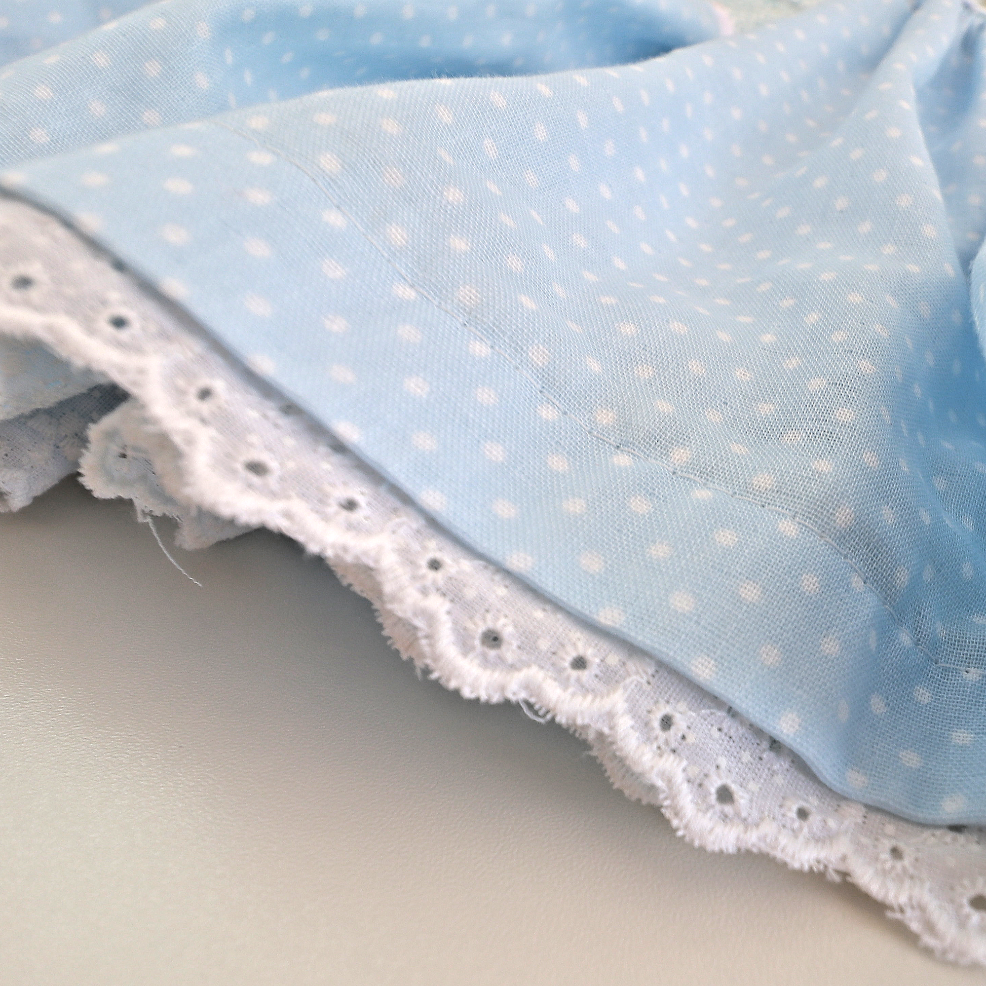 Bonnie twirl skirt with yoke and a gathered circle skirt. With gorgeous lace trim and generous back ties, pdf sewing pattern by frocks and frolics.