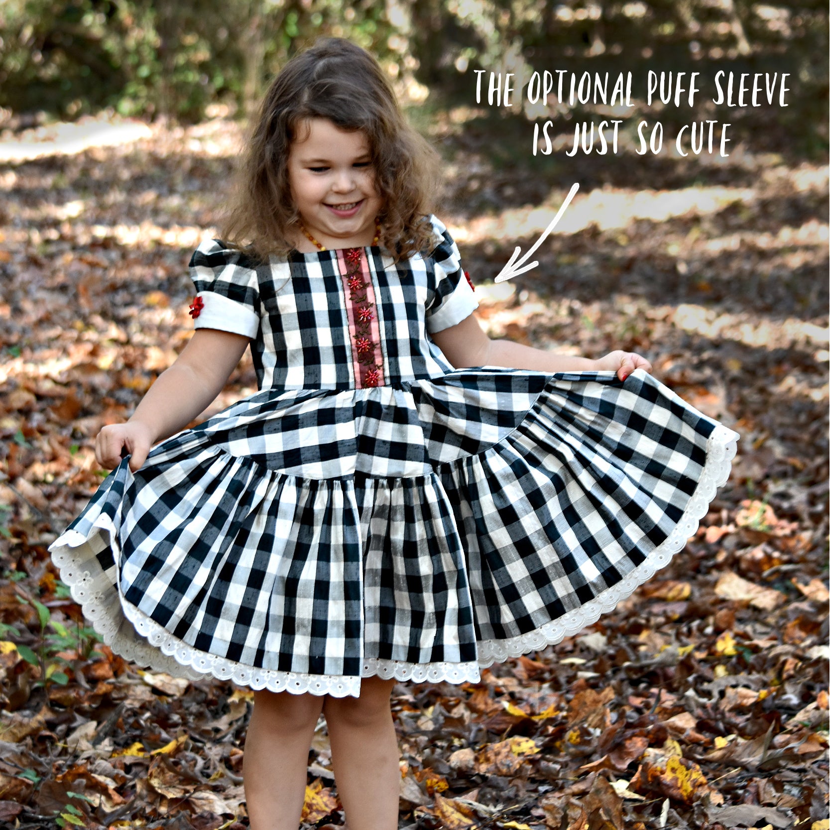 Isabella dress pdf sewing pattern by Frocks and Frolics. Flower Girl Vintage dress with ivory bodice, large gingham print, tudor neckline, short cap sleeves and a button down back closure. Optional pin tucks on the bodice. Comes with detailed video tutorial.