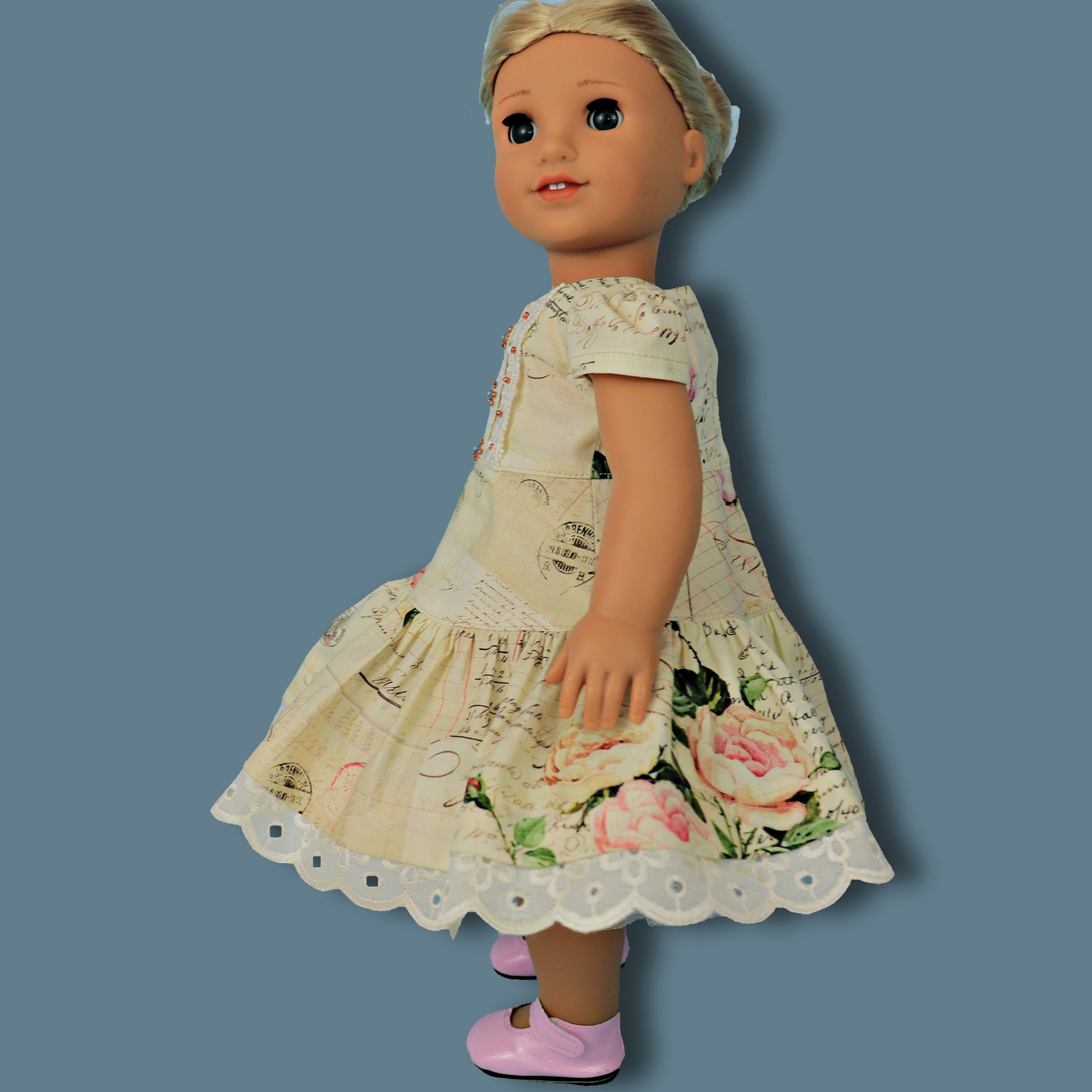 Isabella Doll dress, pdf sewing pattern for American Girl dolls. 18 inch doll clothes. Dress with pin tucks on the fron bodice and velcro closure. You get video tutorials for every step. Side view.