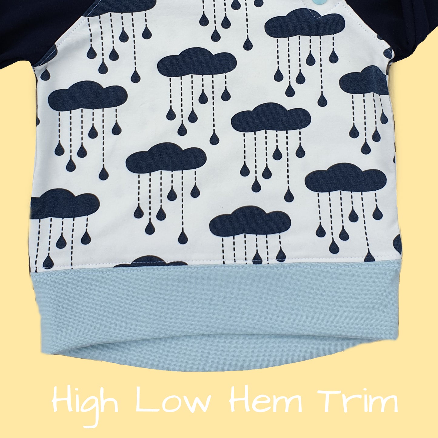 Jelly Bean Sweater, pdf sewing pattern by Frocks & Frolics. Raglan jumper with optional KamSnap opening in the raglan sleeve seam. High low hem trim and cuffs in contrast four way stretch interlock fabric. Includes a free video tutorial.