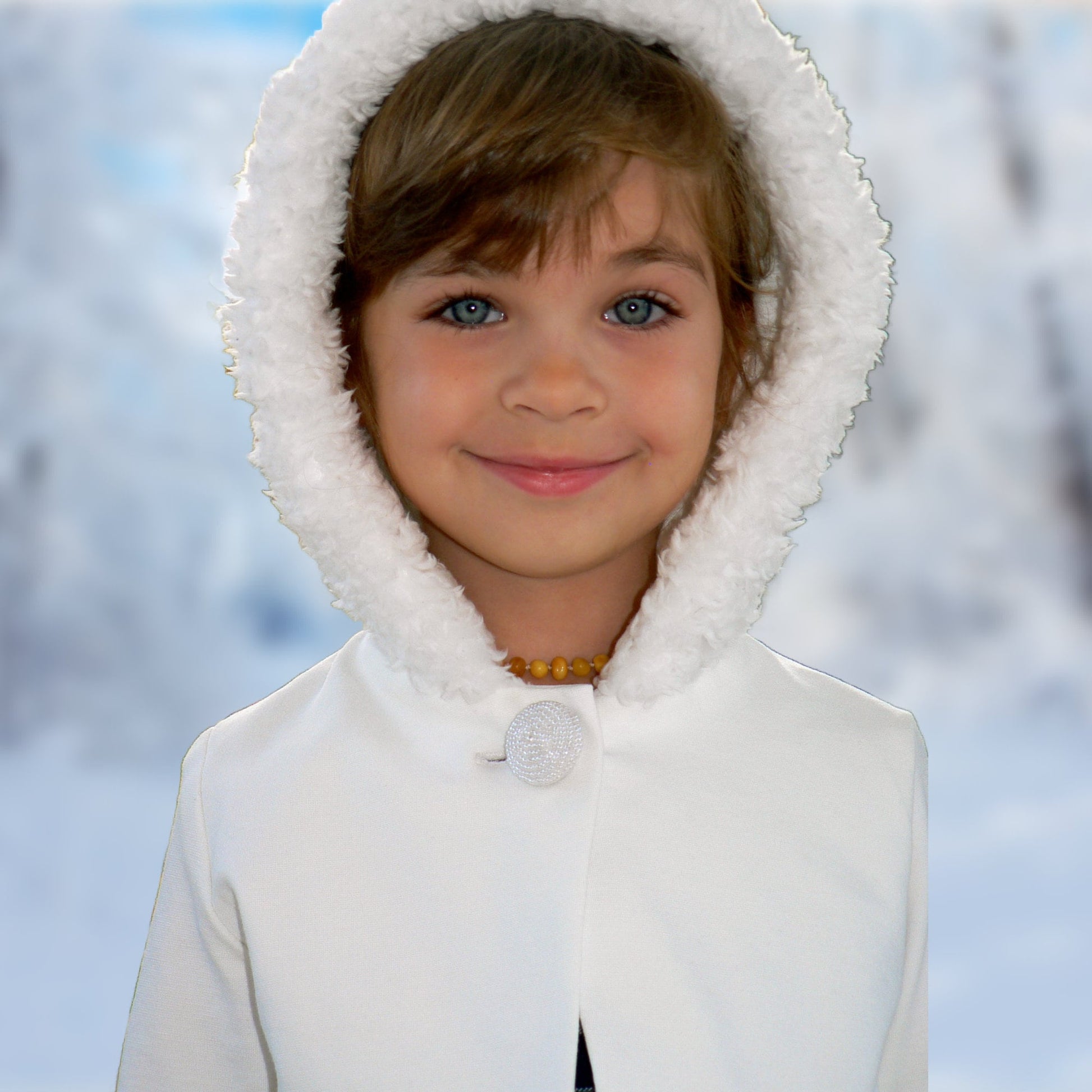 Joanna girls Jersey cardigan. A pdf sewing pattern by Frocks & Frolics. Sweatshirt body and four way stretch sleeves. Gorgeous wide Hoodie with rose trim. Partly lined with button closure. Pattern includes a video tutorial for making the cardigan.