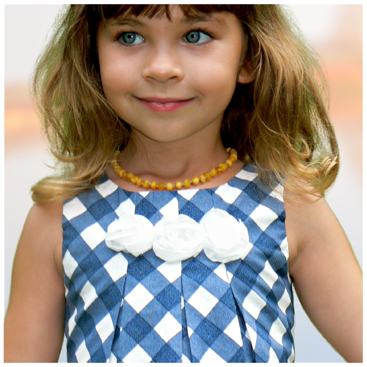 Pretty sleeveless summer dress with front pleats which open out. A-line shape, knee length. Sewing pattern and free video tutorial by Frocks & Frolics.