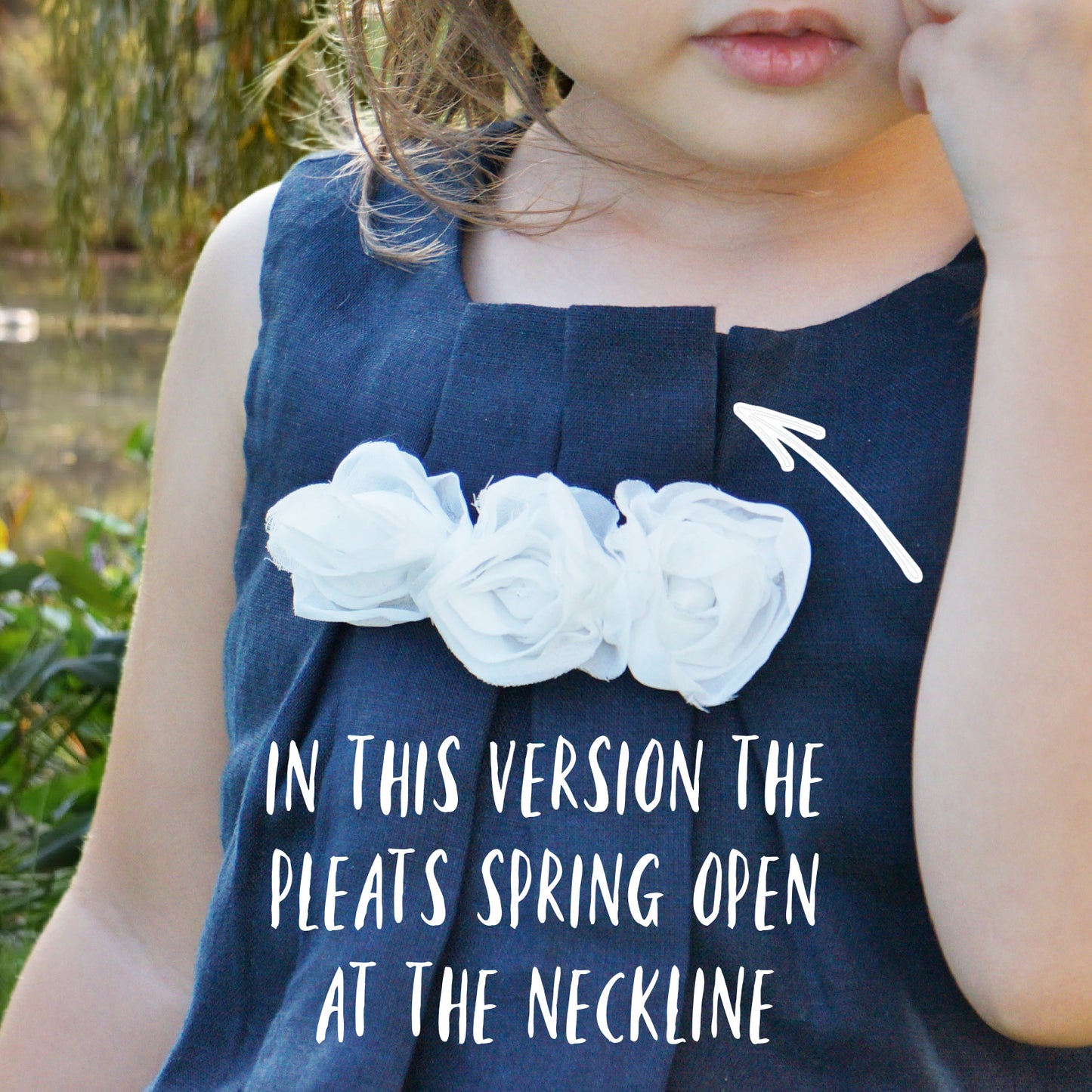 Pretty sleeveless summer dress with front pleats which open out. A-line shape, knee length. Sewing pattern and free video tutorial by Frocks & Frolics.