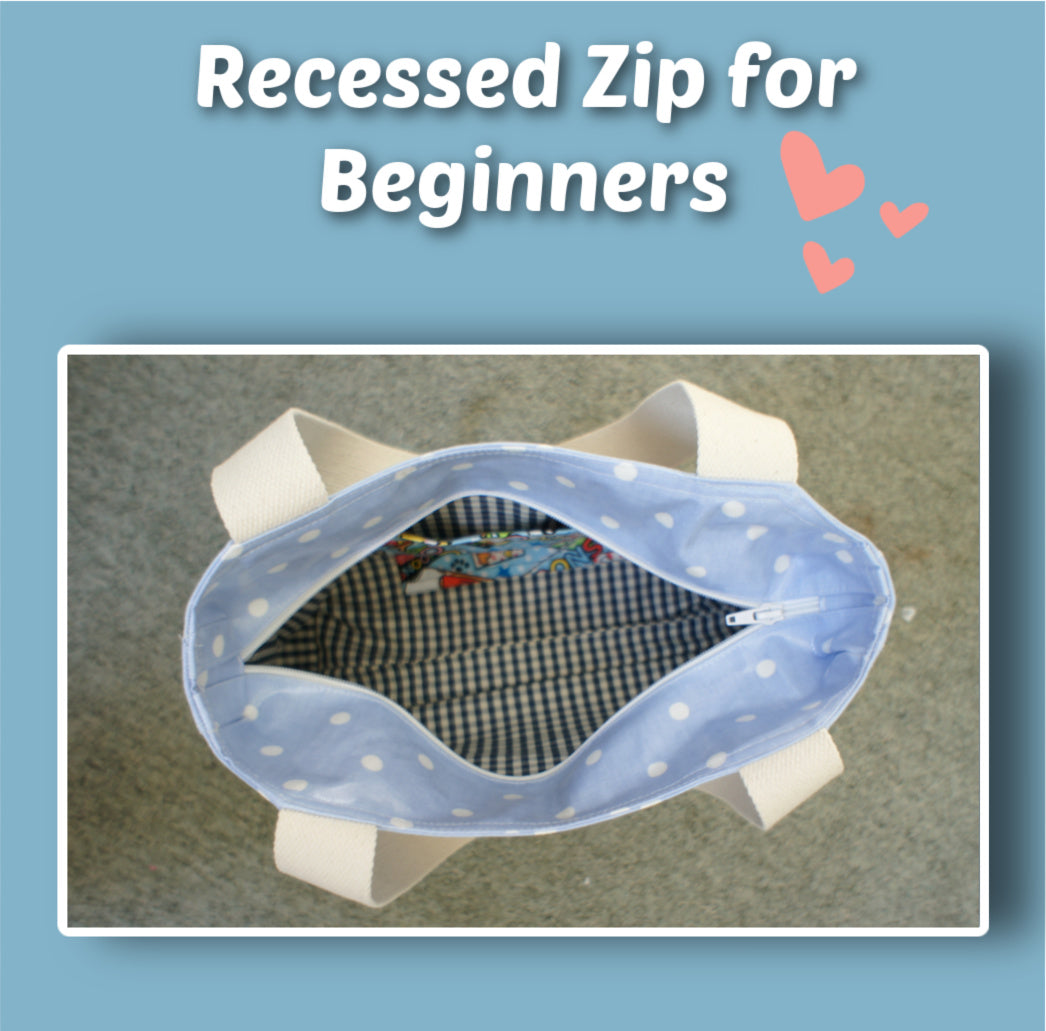 London tote bag pdf sewing pattern by Frocks & Frolics. In laminated oil cloth. Pink with dianty flowers. Wide handles and outside pockets. Fully lined, recessed zip. Comes with a free video course.