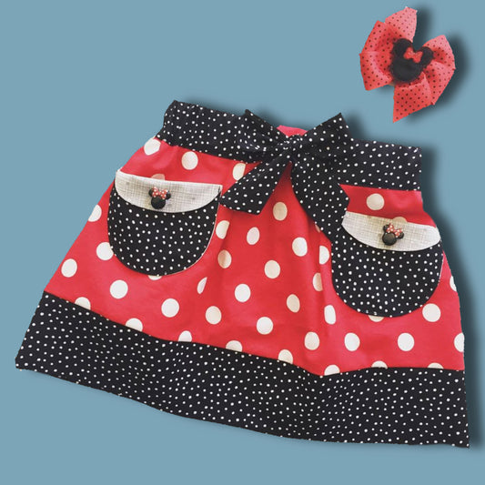Melinda skirt, pdf sewing pattern by Frocks & Frolics. Elasticated waist with feature front panel. Hem trim, Minnie mouse inspired skirt with white on red polka dots  Comes with video tutorial.