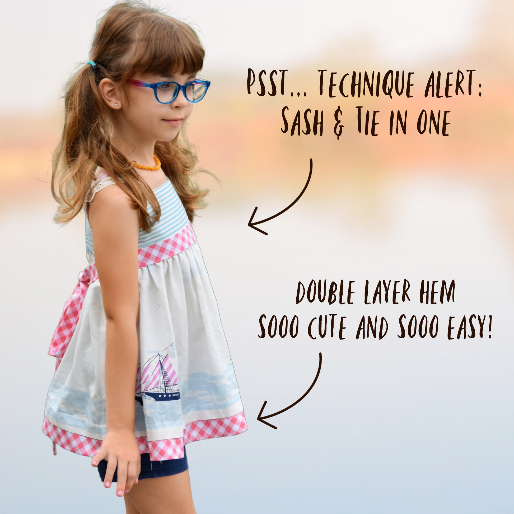 Natalie girls pinafore dress, pdf sewing pattern by Frocks & Frolics. High waist and sash with ties.  Here featuring a combination of Michael Miller fabrics in Gingham and sea side themed fabrics. Double layer hem completes the look.