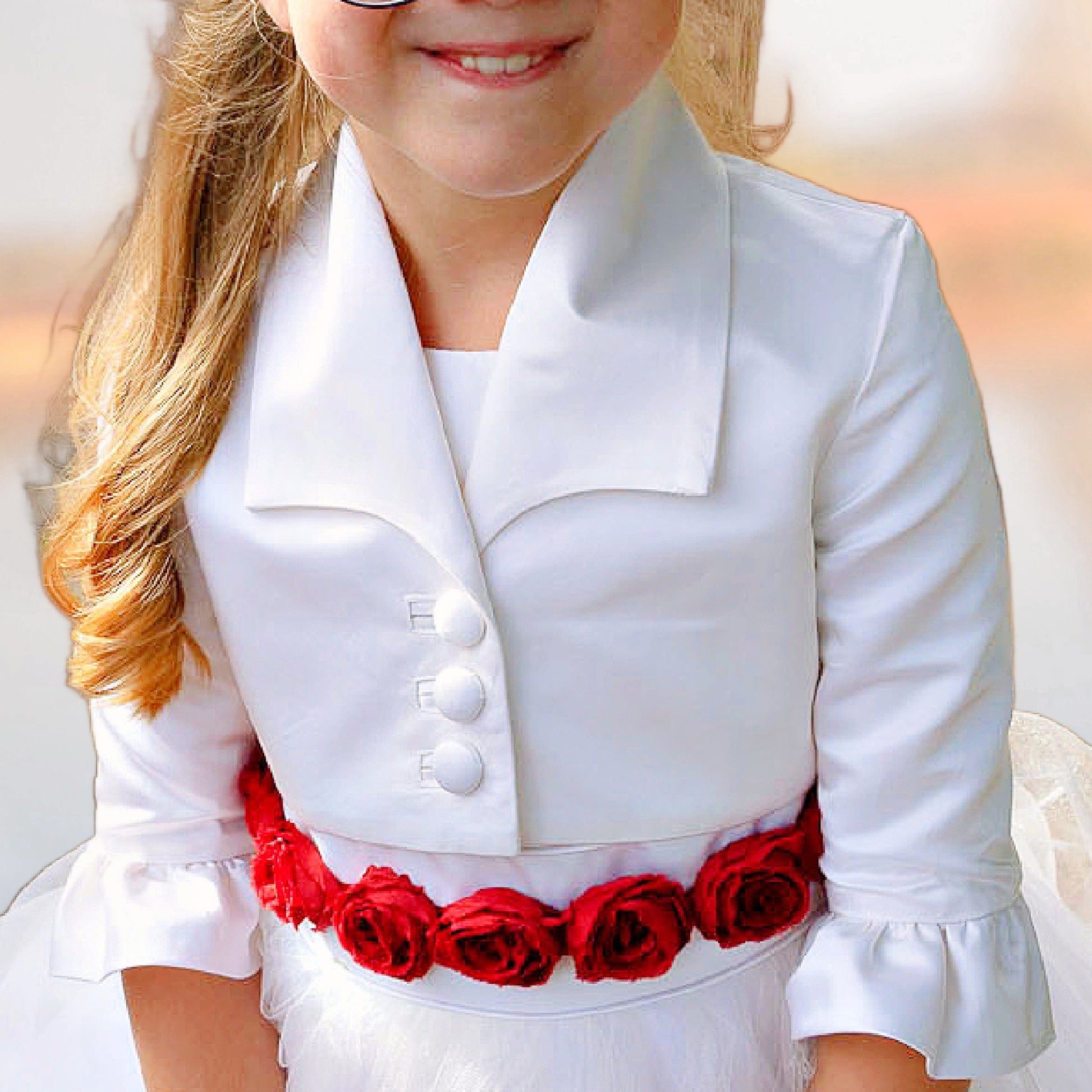 Paris bridal bolero, pdf sewing pattern, waist length bolero with three feature buttons, plain set in sleeves and ruffle hem. Here with the flower girl dress by Frocks & Frolics. Back view of the shawl collar. Perfect hight for flower girl dresses.