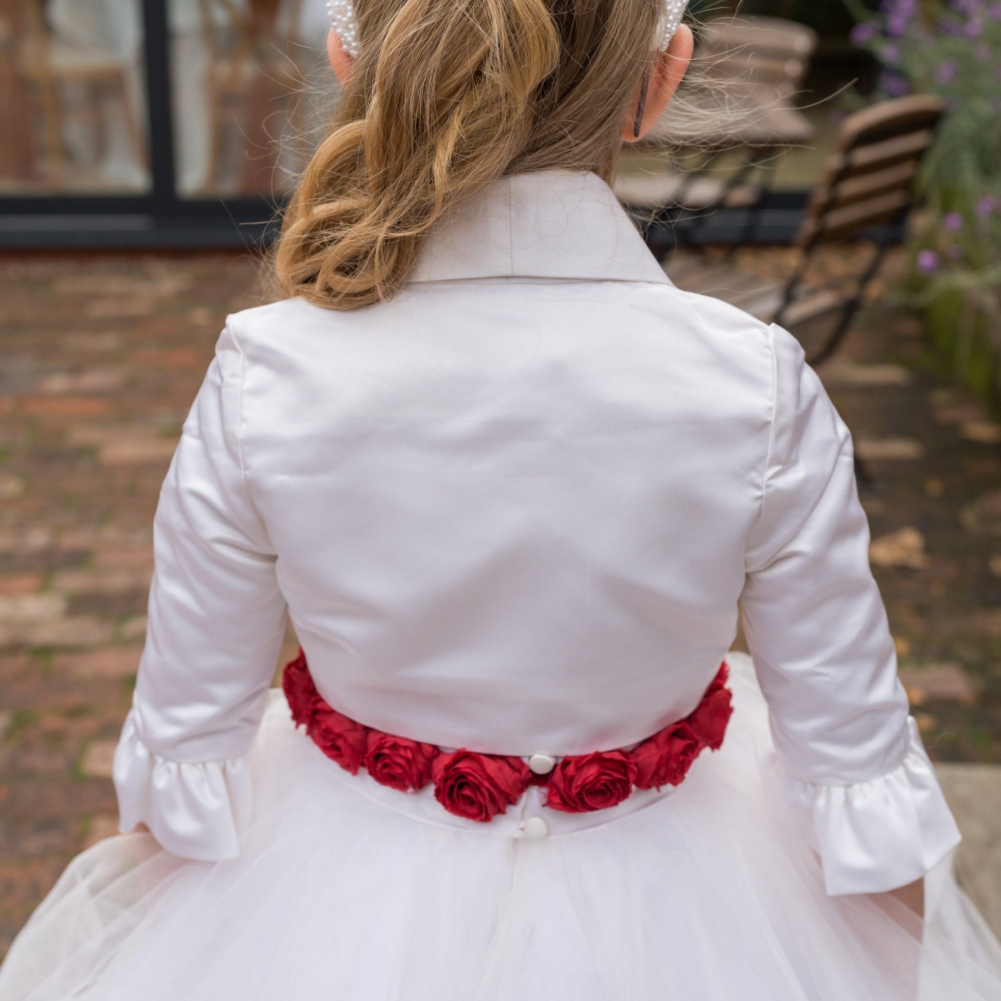Paris bridal bolero, pdf sewing pattern, waist length bolero with three feature buttons, plain set in sleeves and ruffle hem. Here with the flower girl dress by Frocks & Frolics. Back view of the shawl collar. Perfect hight for flower girl dresses.