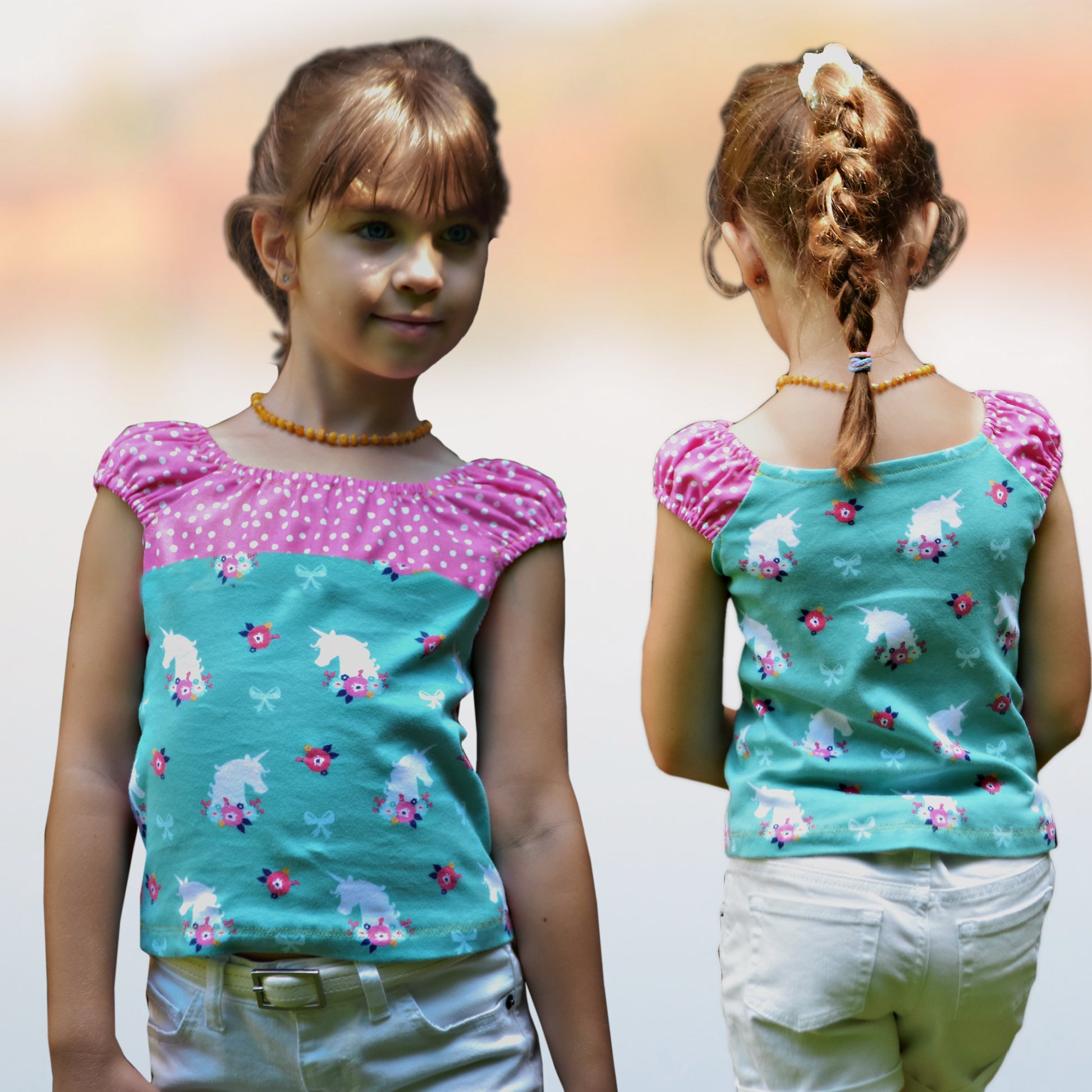 Rosalie peasant blouse pdf sewing pattern for women and girls. Made in knit fabric and woven fabric. Pattern by Frocks & Frolics. Image shows the top for girls in a unicorn print in knit fabric and polka dot woven in quilting fabric.
