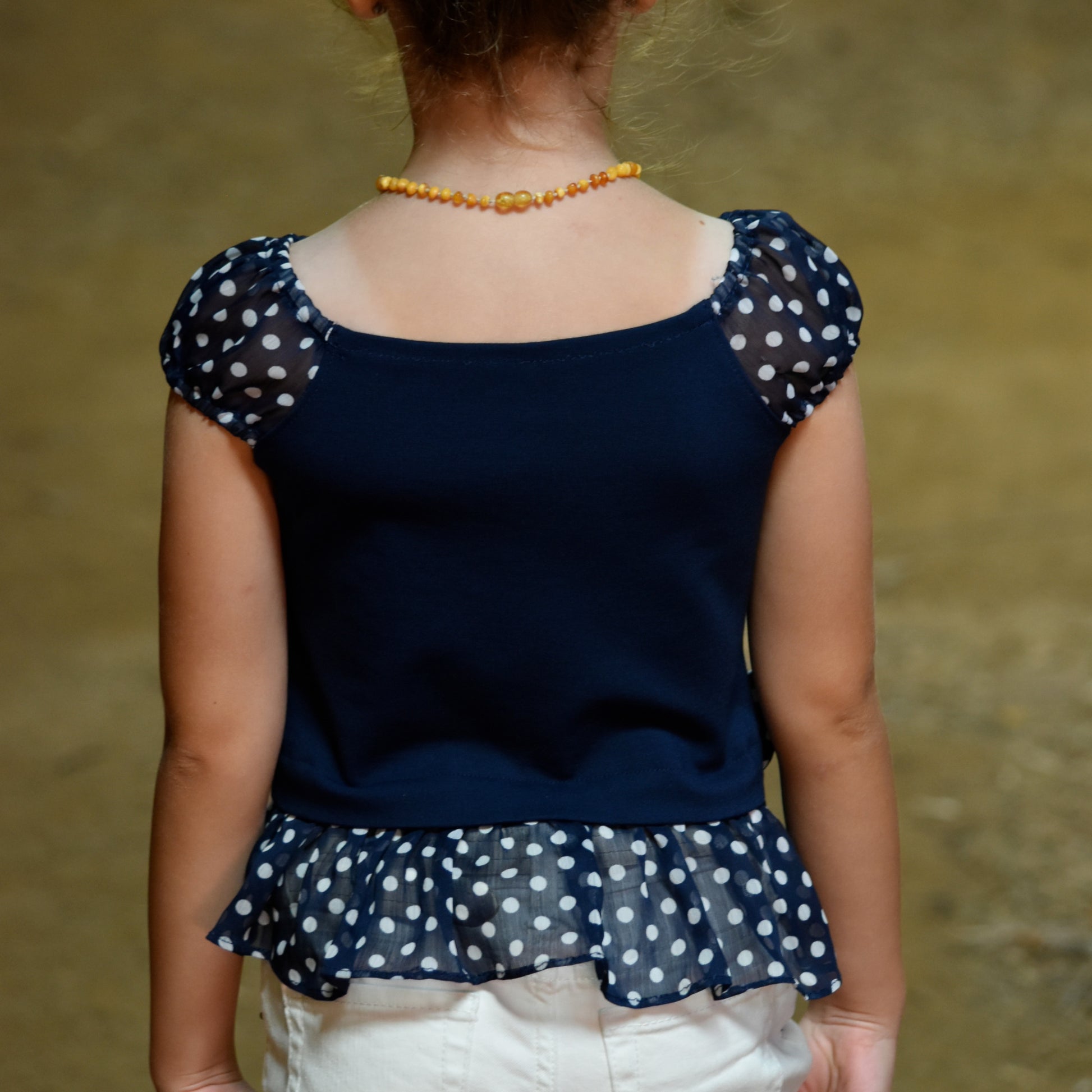 Rosalie peasant blouse pdf sewing pattern for women and girls. Made in knit fabric and woven fabric. Pattern by Frocks & Frolics. Includes a video sewing course.
