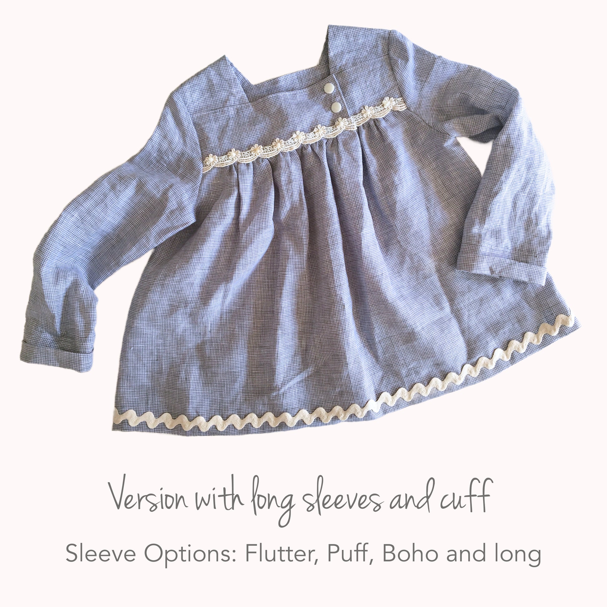 Virginia blouse pdf sewing pattern in nautical style fabrics. With ruffle hem trim and turn up cuff. Tudor neckline and asymmetrical front closure. The pattern includes a video sewing course for all the options.