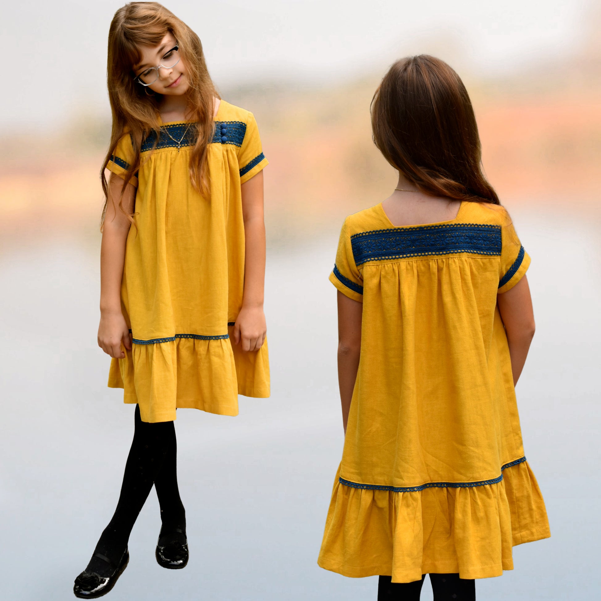 Virginia blouse pdf sewing pattern in nautical style fabrics. With ruffle hem trim and turn up cuff. Tudor neckline and asymmetrical front closure. The pattern includes a video sewing course for all the options. Vintage dress.