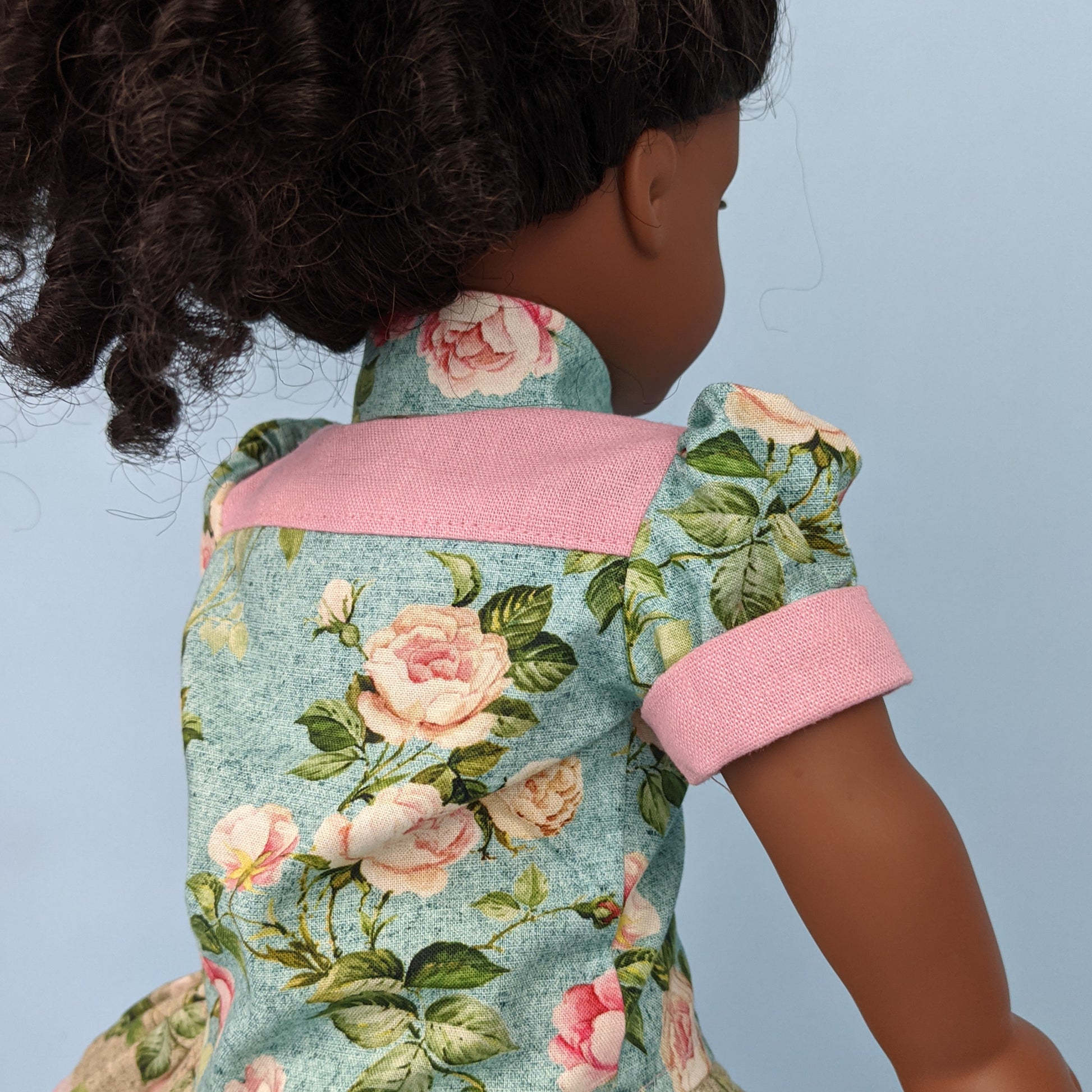 Western blouse sewing pattern for American Girl dolls  by frocks and folics, fitting 18 inch dolls. The fabric is a Michael Miller combo of printed cotton and pastel pink linen.