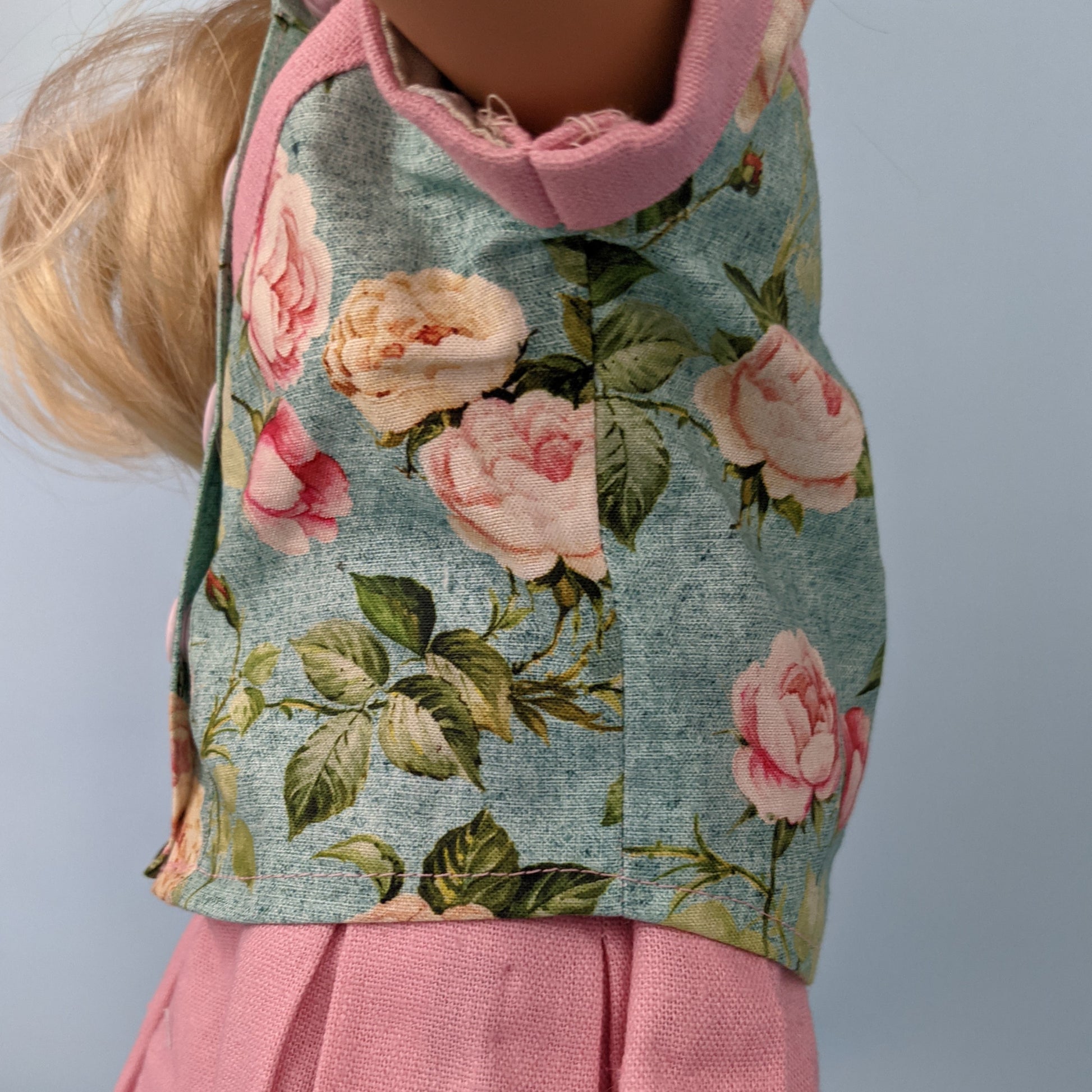 Western blouse sewing pattern for American Girl dolls  by frocks and folics, fitting 18 inch dolls. The fabric is a Michael Miller combo of printed cotton and pastel pink linen.