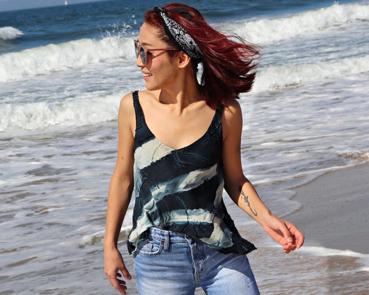 Woman wearing a bias-cut tank top with bias-bound neckline and armholes