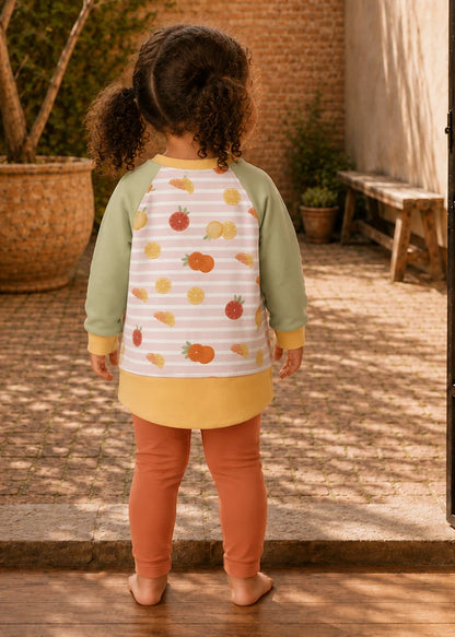 Bubble Gum Joggers & Jelly Bean Sweater patterns – autumn print raglan and rust joggers on a girl, back view