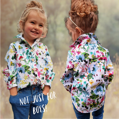 Cool shirt, pdf sewing pattern for a button down shirt by Frocks & Frolics. The shirt has a flower print. High low hem feature. Includes a video sewing course explaining every step in detail. Front and back view. Girls shirt version.