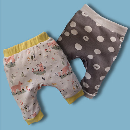 Bubble Gum baby pants, pdf sewing pattern by Frocks & Frolics. Cute litte romper with elasticated waistband, side pockets and hem ribbing. Comes with a video sewing course for every step.