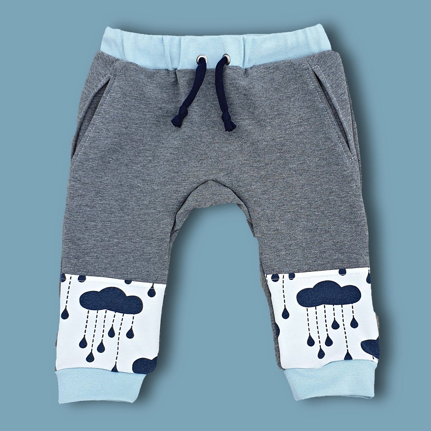 Bubble Gum baby pants, pdf sewing pattern by Frocks & Frolics. Cute litte romper with elasticated waistband, side pockets and hem ribbing. Comes with a video sewing course for every step.