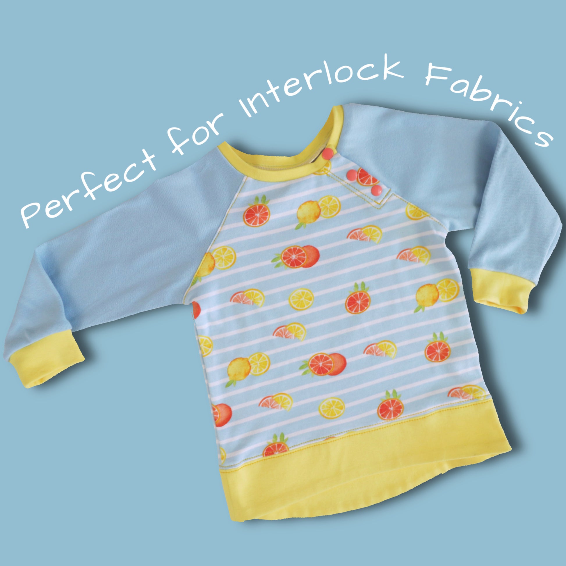 Jelly Bean Sweater, pdf sewing pattern by Frocks & Frolics. Raglan jumper with optional KamSnap opening in the raglan sleeve seam. High low hem trim and cuffs in contrast four way stretch interlock fabric. Includes a free video tutorial.
