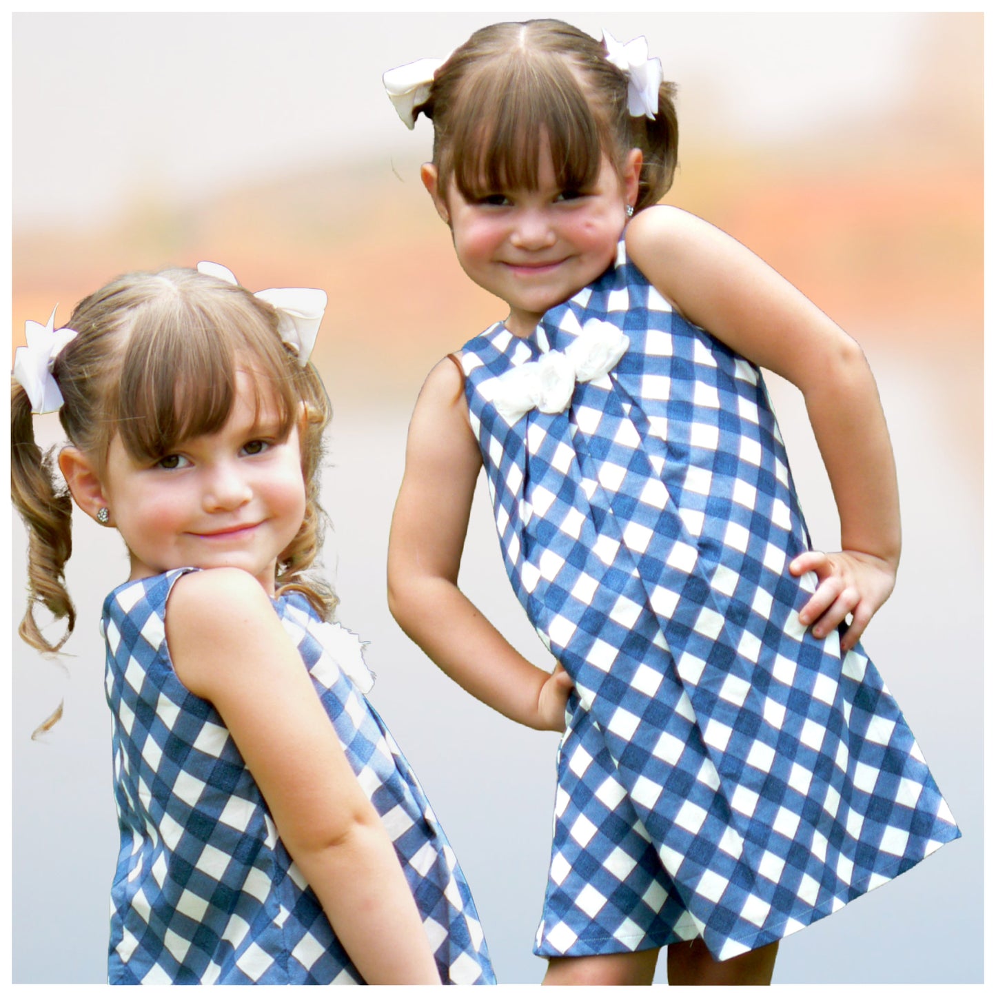 Pretty sleeveless summer dress with front pleats which open out. A-line shape, knee length. Sewing pattern and free video tutorial by Frocks & Frolics. 