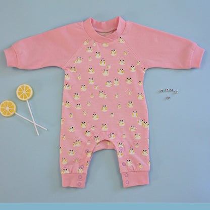 Lollipop romper, pdf sewing pattern by frocks and frolics. Raglan sleeves and full length legs with cuffs. Gusset in the inner leg seam and KamSnap closure.Teddybear print. Comes with video tutorial.