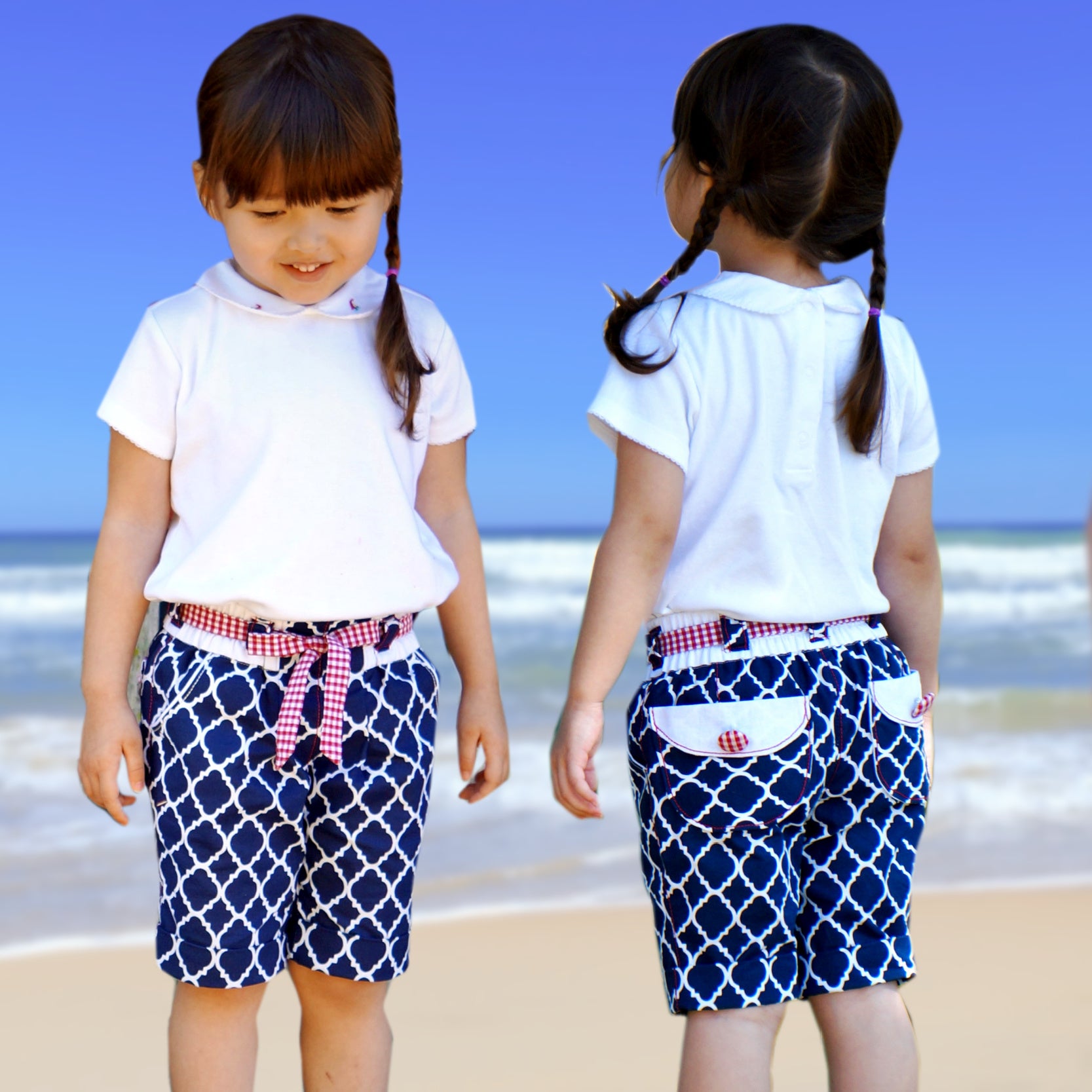 Maisy shorts pdf sewing pattern by Frocks & Frolics. Blue and white print with belt loopes, ties, side pockets and back patch pockets. The pattern includes video tutorials for every step.