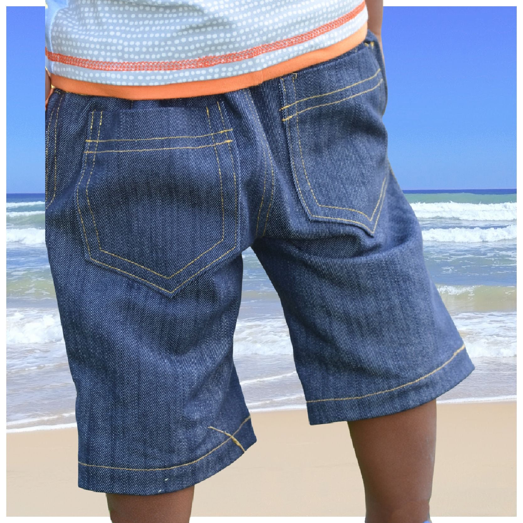 Oscar shorts, pdf sewing pattern by frocks and frolics, boys slacks, Bermuda shorts, age 1-14. Shorts have side pockets an elasticated waist and contrast turn up. Back view.