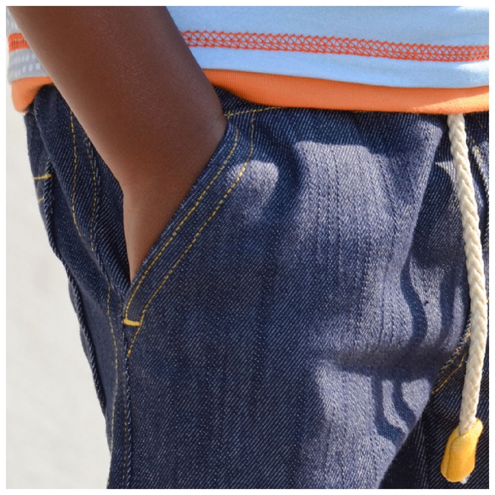 Oscar shorts, pdf sewing pattern by frocks and frolics, boys slacks, Bermuda shorts, age 1-14. Shorts have side pockets an elasticated waist and contrast turn up. Side view of the pockets.