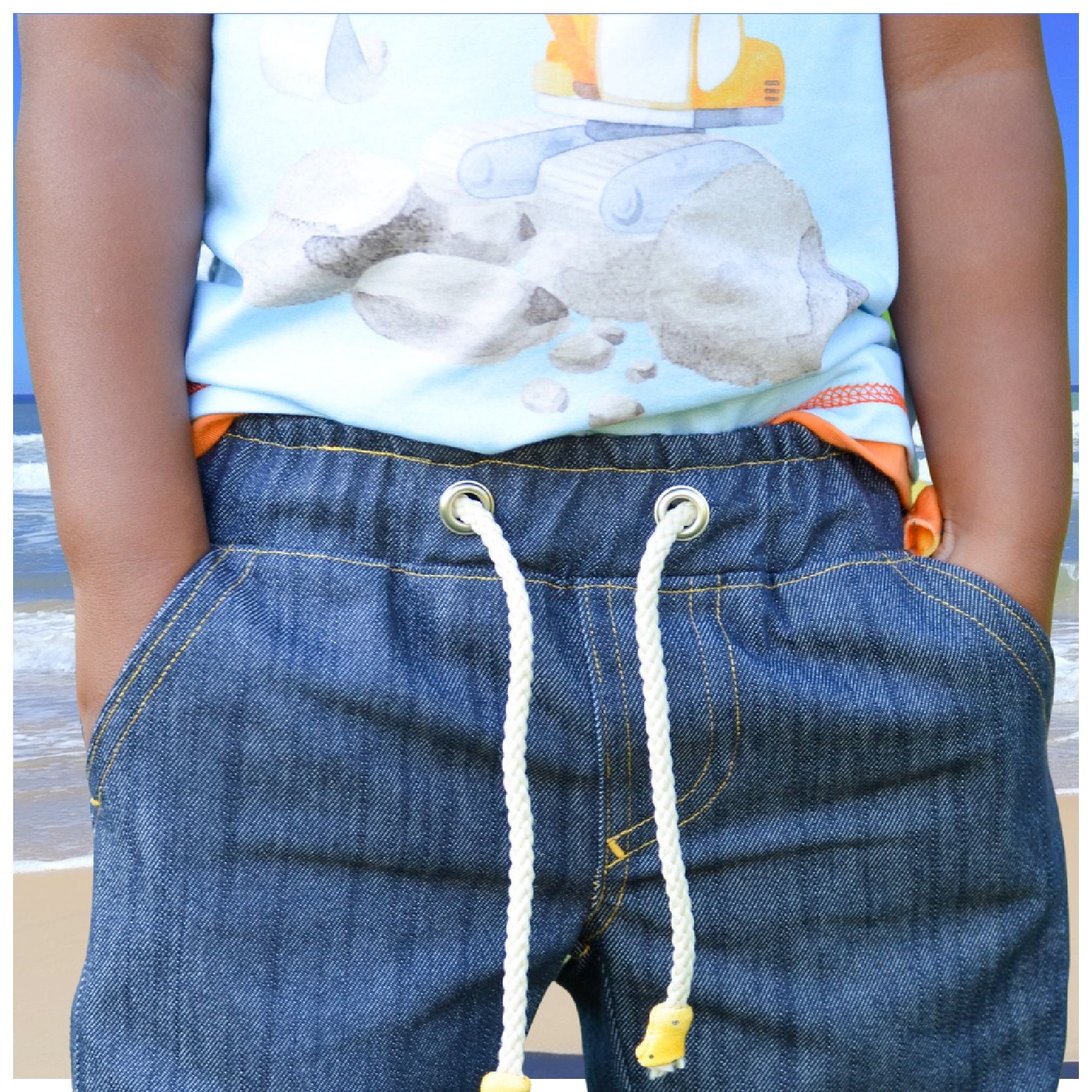 Oscar shorts, pdf sewing pattern by frocks and frolics, boys slacks, Bermuda shorts, age 1-14. Shorts have side pockets an elasticated waist and contrast turn up.