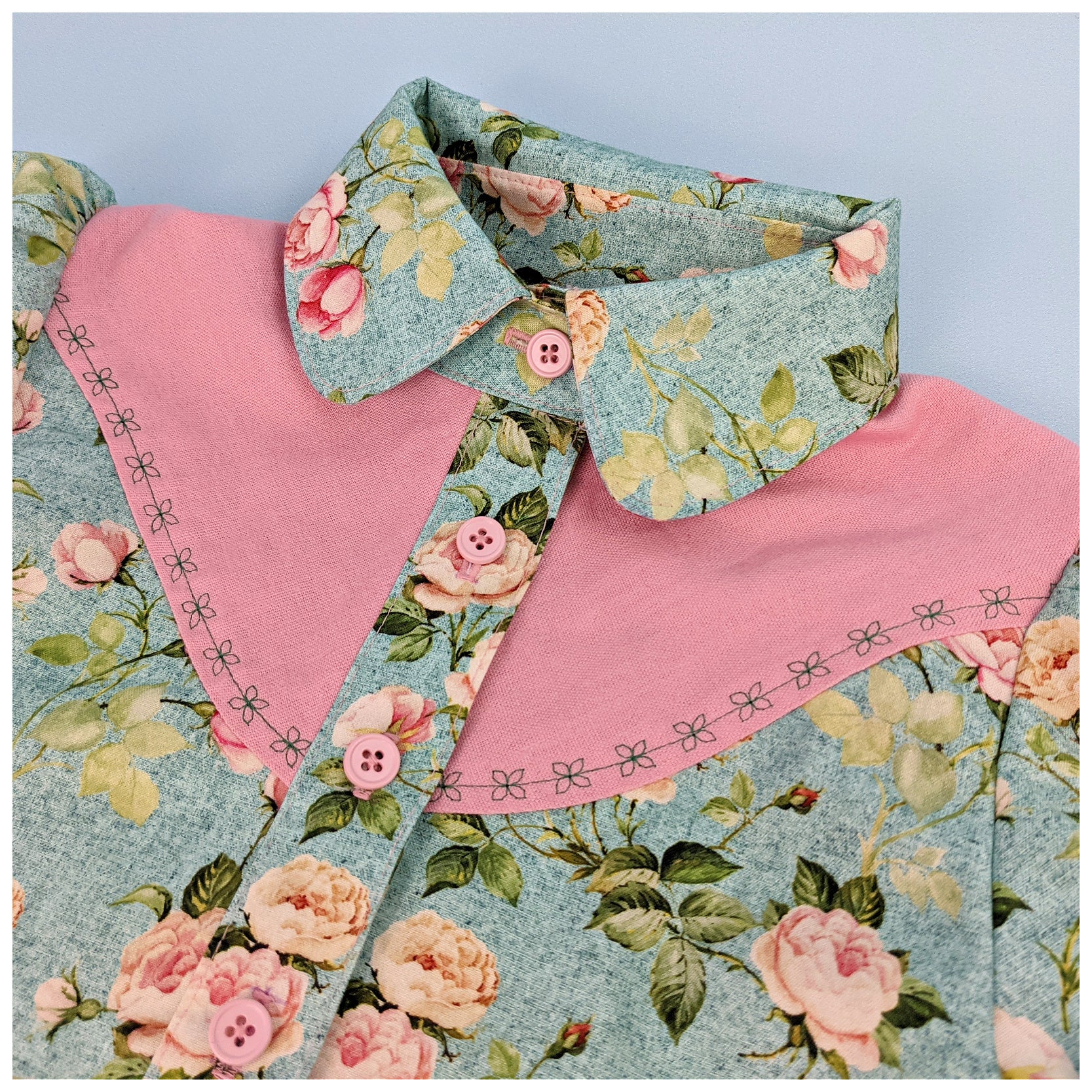 Western blouse, country style blouse with yoke, puff sleeves and button placket. Here in Michael Miller printed cotton and pink linen for the yoke and tun ups. Close up of the hem finish.