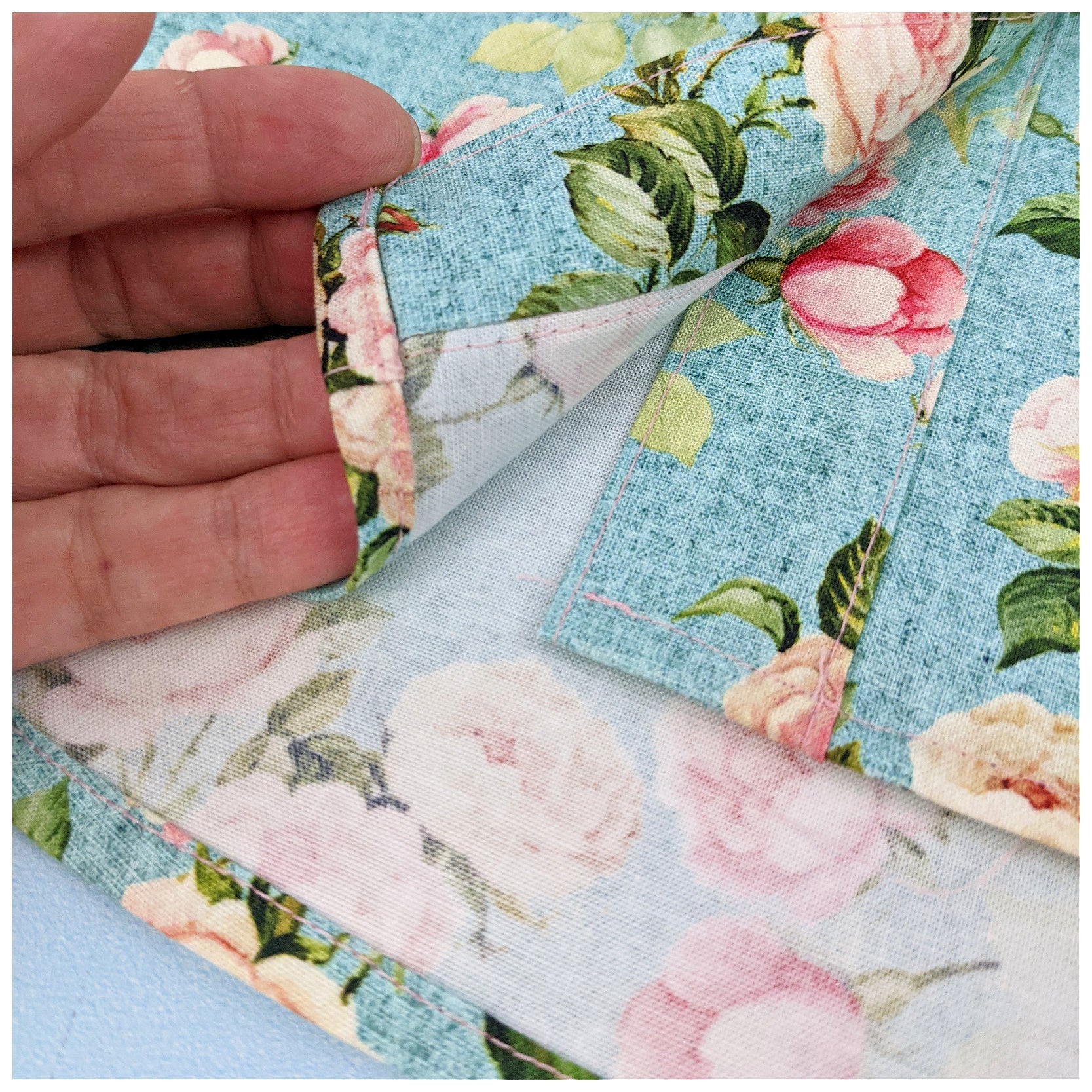 Western blouse, country style blouse with yoke, puff sleeves and button placket. Here in Michael Miller printed cotton and pink linen for the yoke and tun ups. Close up of the hem finish.