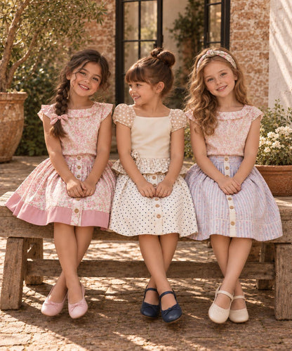 Frocks & Frolics Betsy skirt sewing pattern – three girls in button-front skirt variations