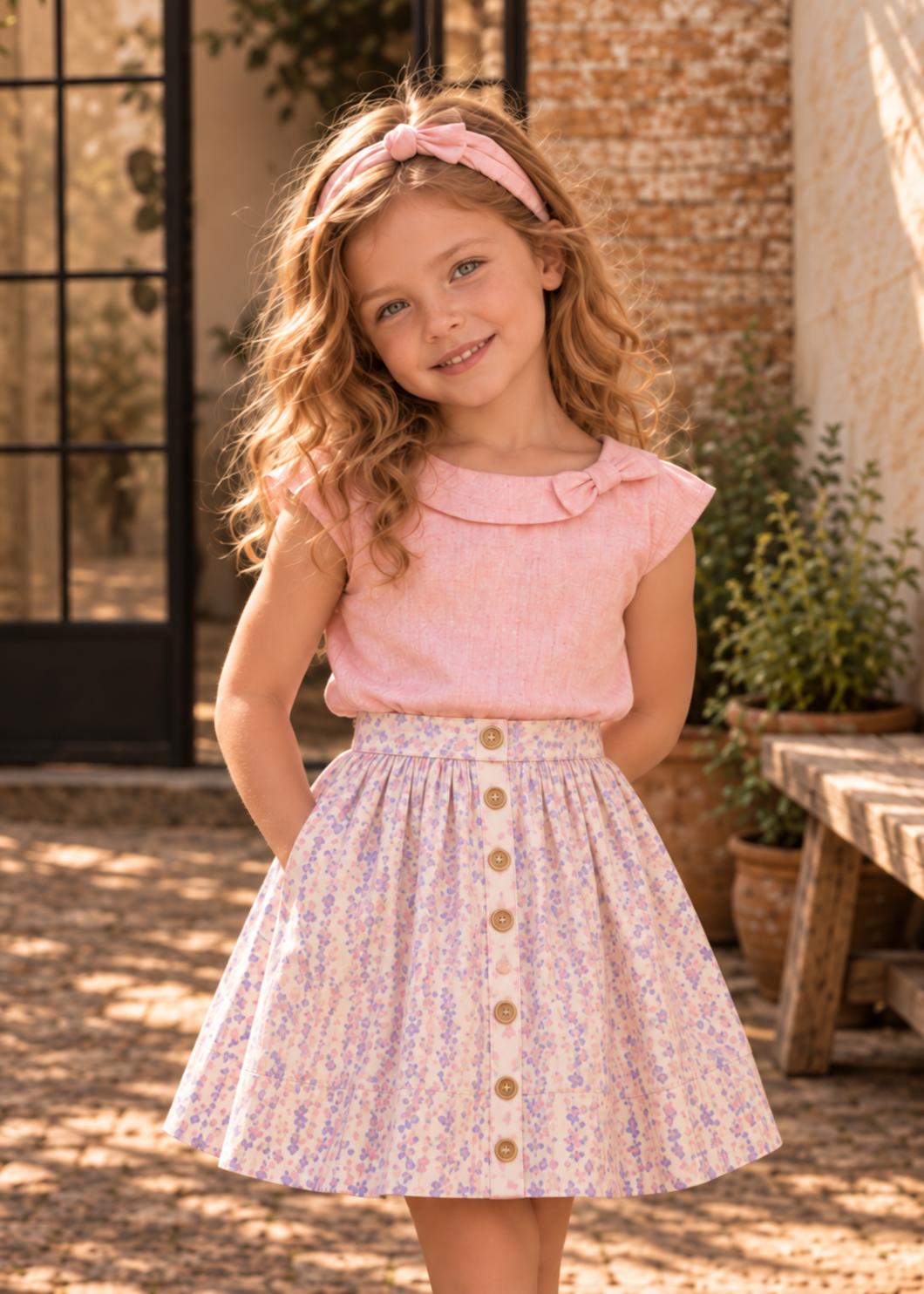 Frocks & Frolics Betsy skirt sewing pattern – purple floral button-front skirt with pink headband