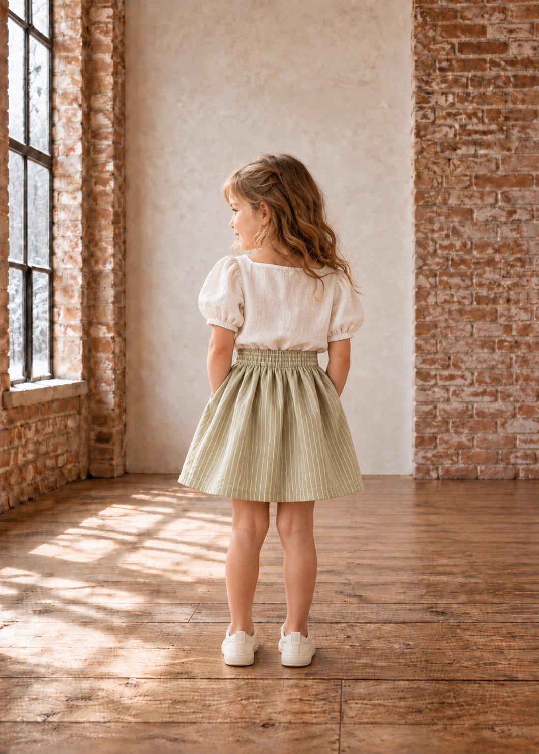Frocks & Frolics Betsy skirt sewing pattern – back view of sage pinstripe elastic waist skirt