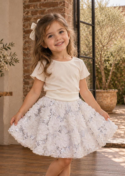Frocks & Frolics Caitlin circle skirt sewing pattern – white skirt with floral appliqués and sequins