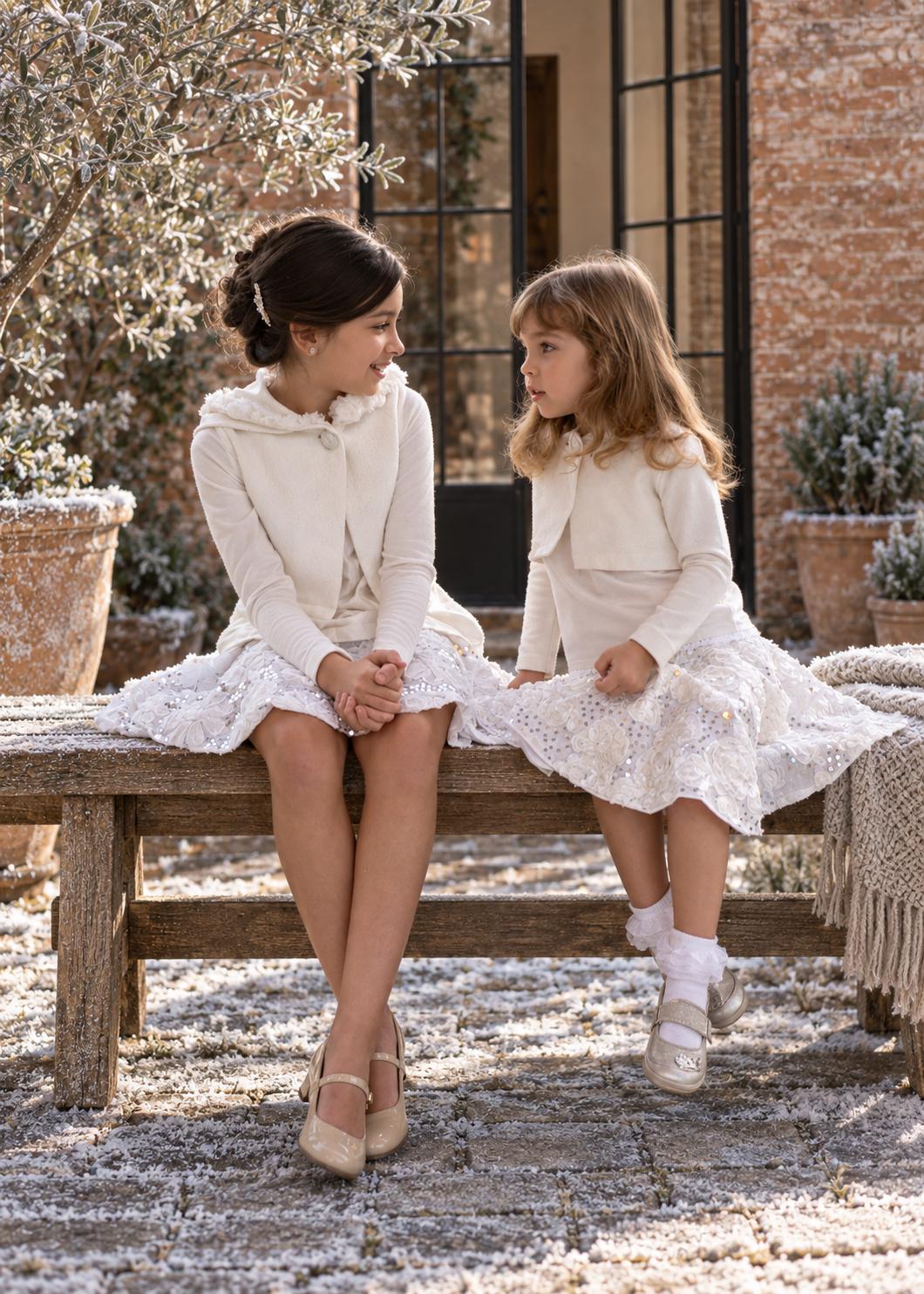 Frocks & Frolics Caitlin circle skirt sewing pattern – two girls in white lace and sequin skirts